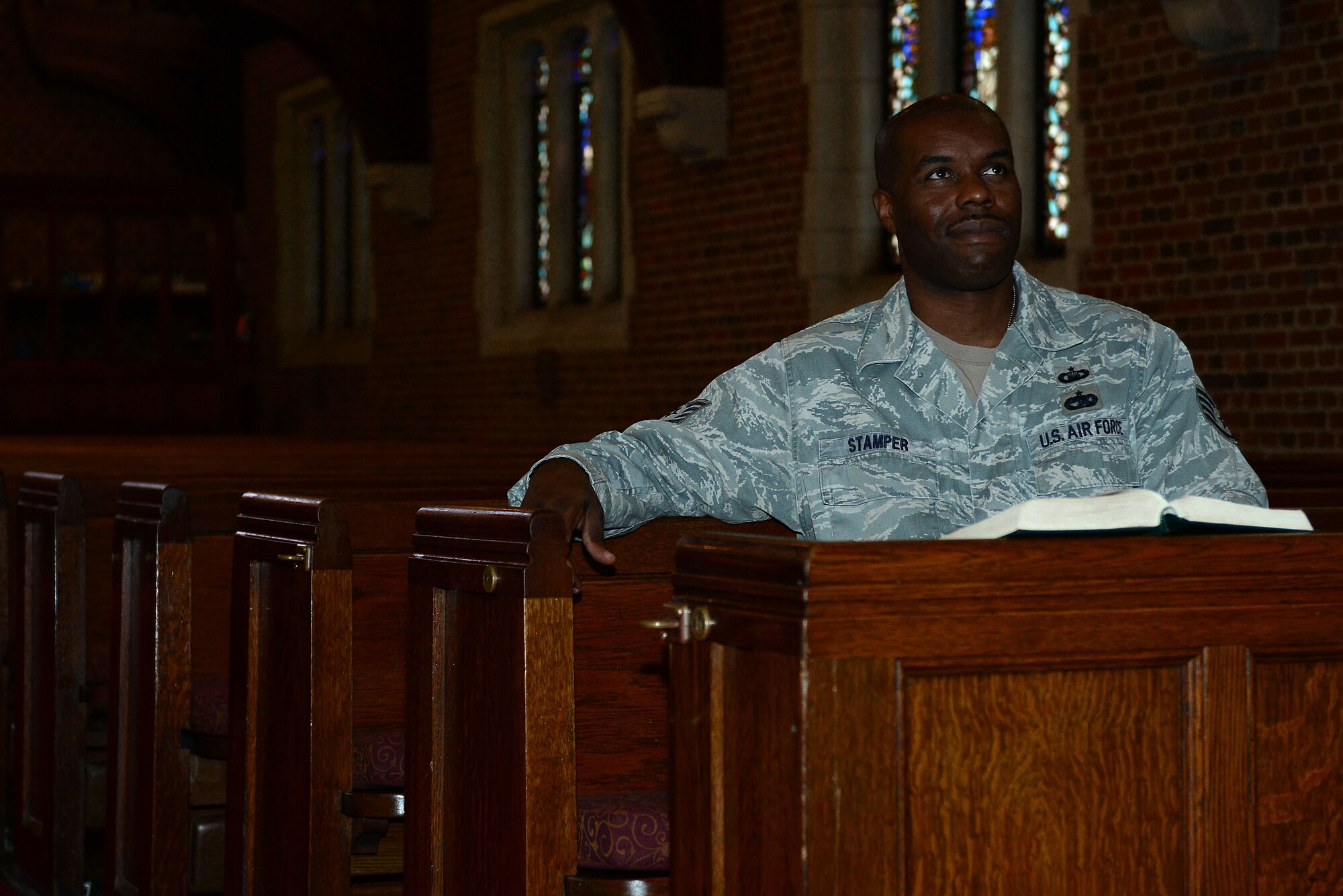U.S. Air Force Staff Sgt. Charles Stamper, 633rd Air Base Wing chaplain assistant, orginially began his career as a vehicle operator. Stamper has been in the Air Force for more than 14 years, and finds satisfaction in serving his Air Force family. (U.S. Air Force photo by Airman 1st Class Kimberly Nagle/Released)