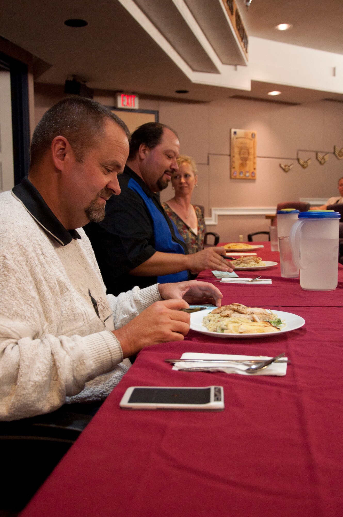 130913-F-GZ967-057 Mike Hayes, husband of Col. Tracey Hayes, 90th Missile Wing commander; prepares to taste the chicken alfredo prepared by the 321st Missile Squadron missile chefs during a top chef competition Sept. 13, 2013. The top chef competition was between the missile chefs from the F.E. Warren Air Force Base, Wyo., 319th, 320th, and 321st Missile Squadrons. (U.S. Air Force photo by Airman 1st Class Brandon Valle)