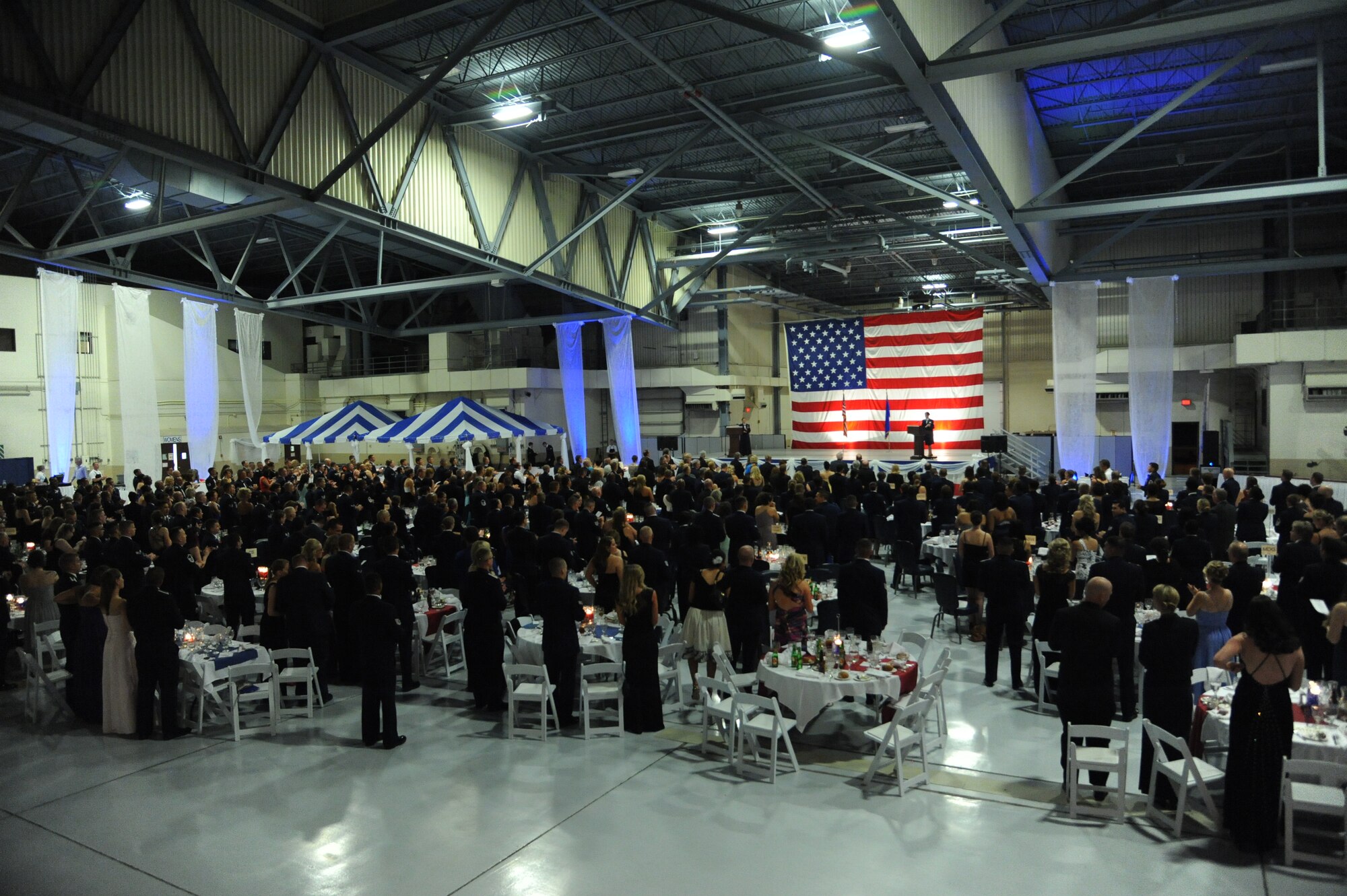Attendees give a standing ovation to volunteers who helped make the this year’s Air Force Ball a success, Sept. 13 on Grand Forks Air Force Base, N.D. The Air Force Ball is an annual Air Force-wide tradition to celebrate the establishment of the Air Force as its own branch of service in 1947. (U.S. Air Force photo/Airman 1st Class Zachiah A. Roberson)