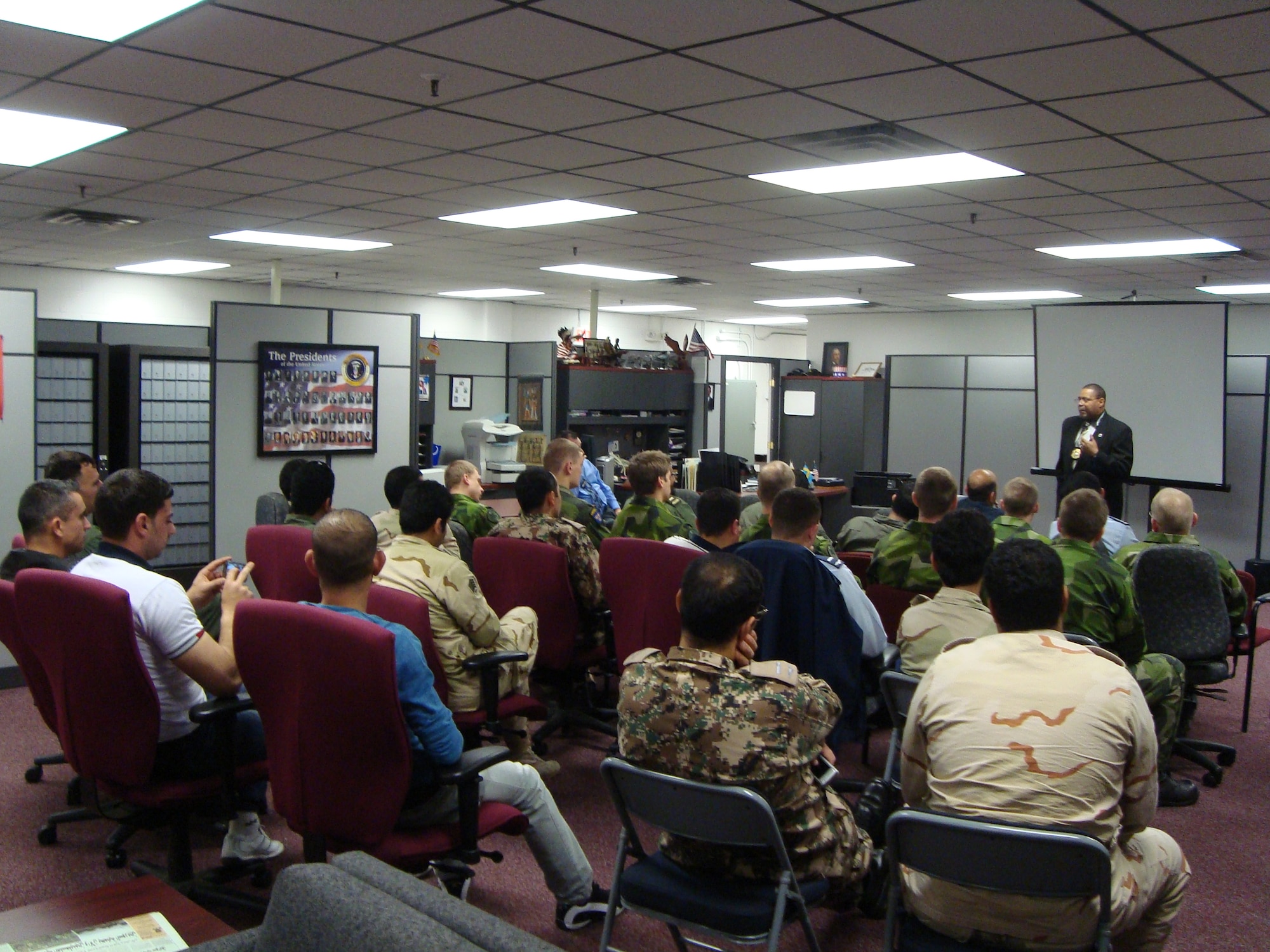 Foreign students listen to a lecture at Fort Eustis, Va., Jan. 26, 2012. When the Field Studies Program is not hosting tours, they invite guest speakers to talk on a plethora of topics from the education system to American politics. (U.S. Army courtesy photo)