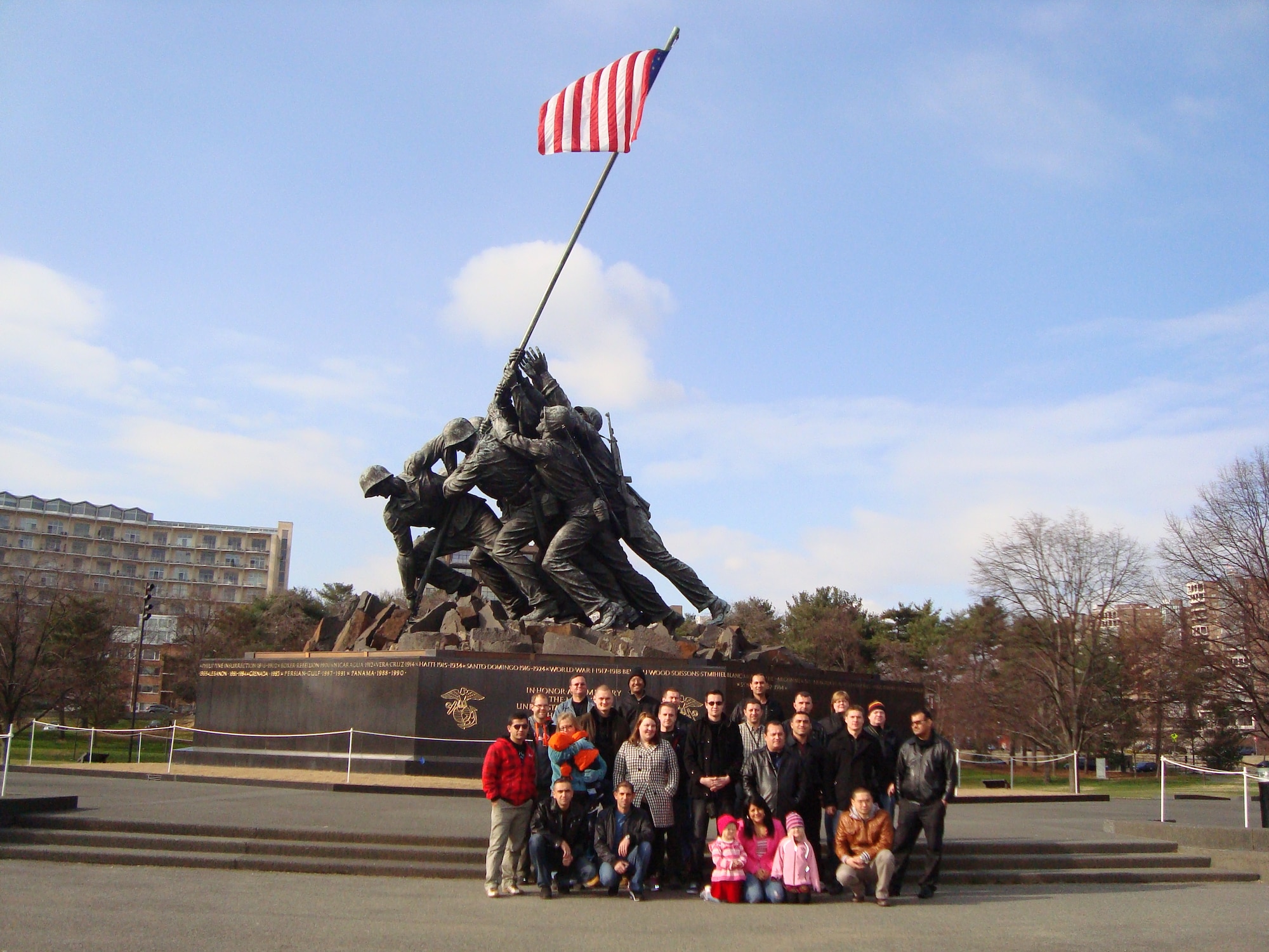 Foreign students pose in front of the Marine Corps War Memorial in Washington D.C. during a Field Studies Program trip Dec. 18, 2011. Students learn about American politics, government infrastructure and more thanks to the FSP’s trips. (U.S. Army courtesy photo)