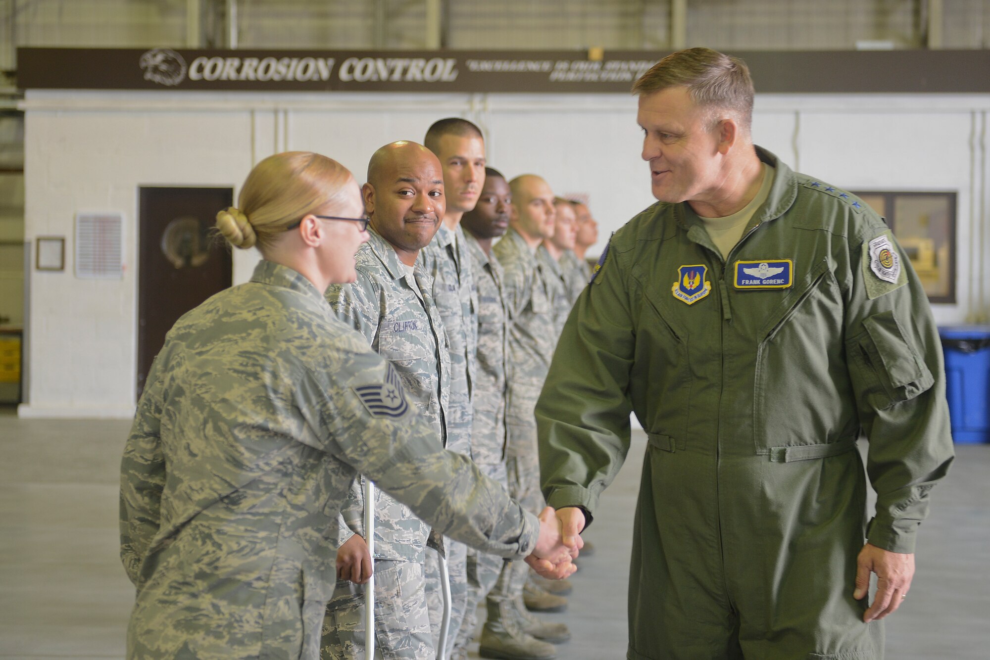 Gen. Frank Gorenc, U.S. Air Forces in Europe and Air Forces Africa commander (right) greets 48th Maintenance Group personnel during his visit to Royal Air Force Lakenheath, England, Sept. 12, 2013. The general’s visit provided him the opportunity to meet with Liberty Airmen in various squadrons throughout his visit. (U.S. Air Force photo by Airman 1st Class Trevor T. McBride/Released)