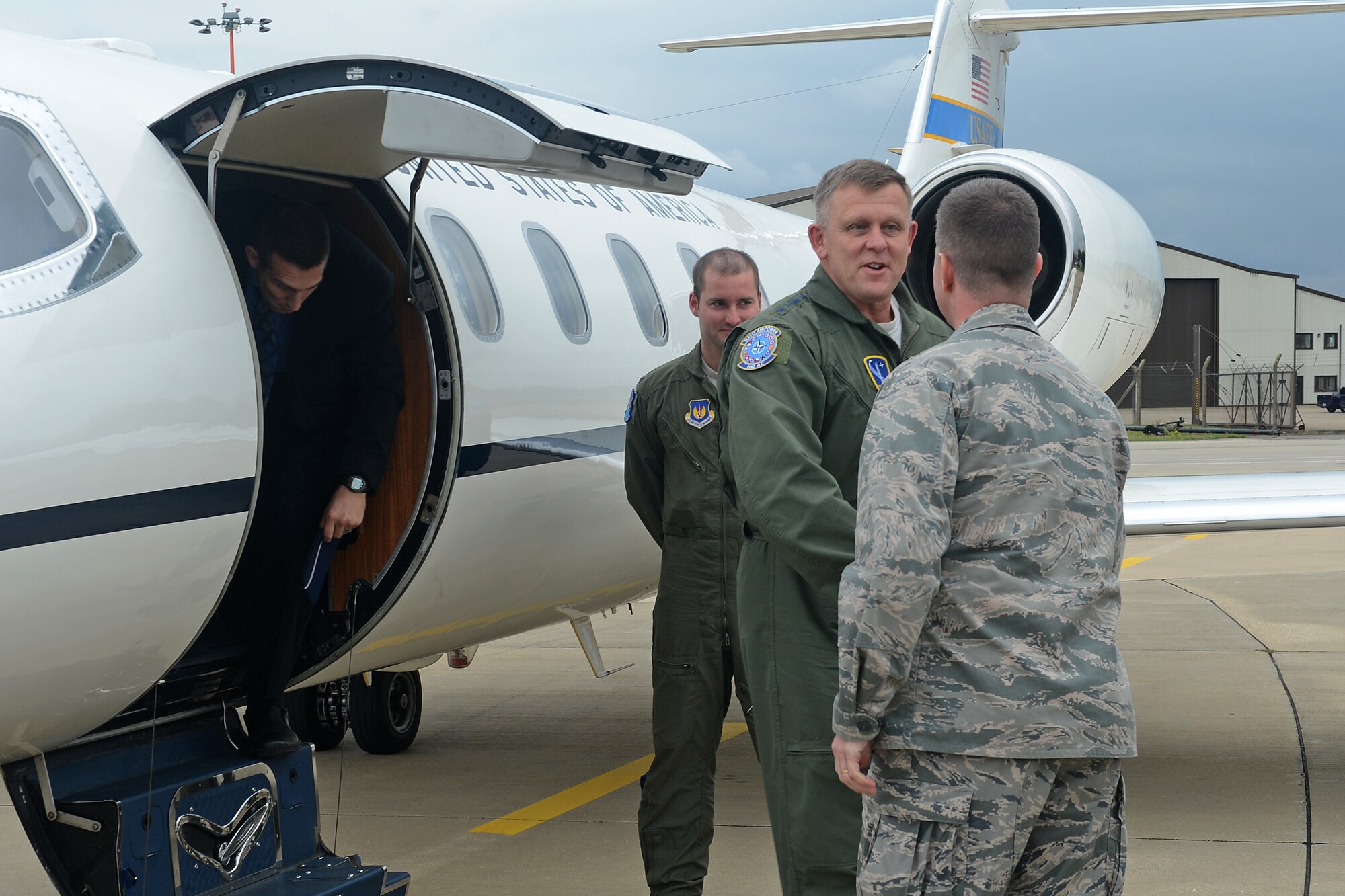 Gen. Frank Gorenc, U.S. Air Forces in Europe and Air Forces Africa commander, receives a welcome from Col. Kyle Robinson, 48th Fighter Wing commander, to Royal Air Force Lakenheath, England, Sept. 11, 2013. Gorenc visited RAF Lakenheath for the first time as the USAFE-AFAFRICA commander. (U.S. Air Force photo by Airman 1st Class Trevor T. McBride/Released)
