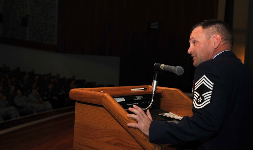 U.S. Air Force Chief Master Sgt. Michael Radford, 18th Equipment Maintenance Squadron maintenance flight chief, speaks during the NCO Academy Class 13-6/Airman Leadership School Class 13-F combined graduation ceremony at the Keystone Theater on Kadena Air Base, Japan, Sept. 13, 2013. During his speech, Radford spoke on many issues affecting today’s Air Force. (U.S. Air Force photo by Naoto Anazawa)