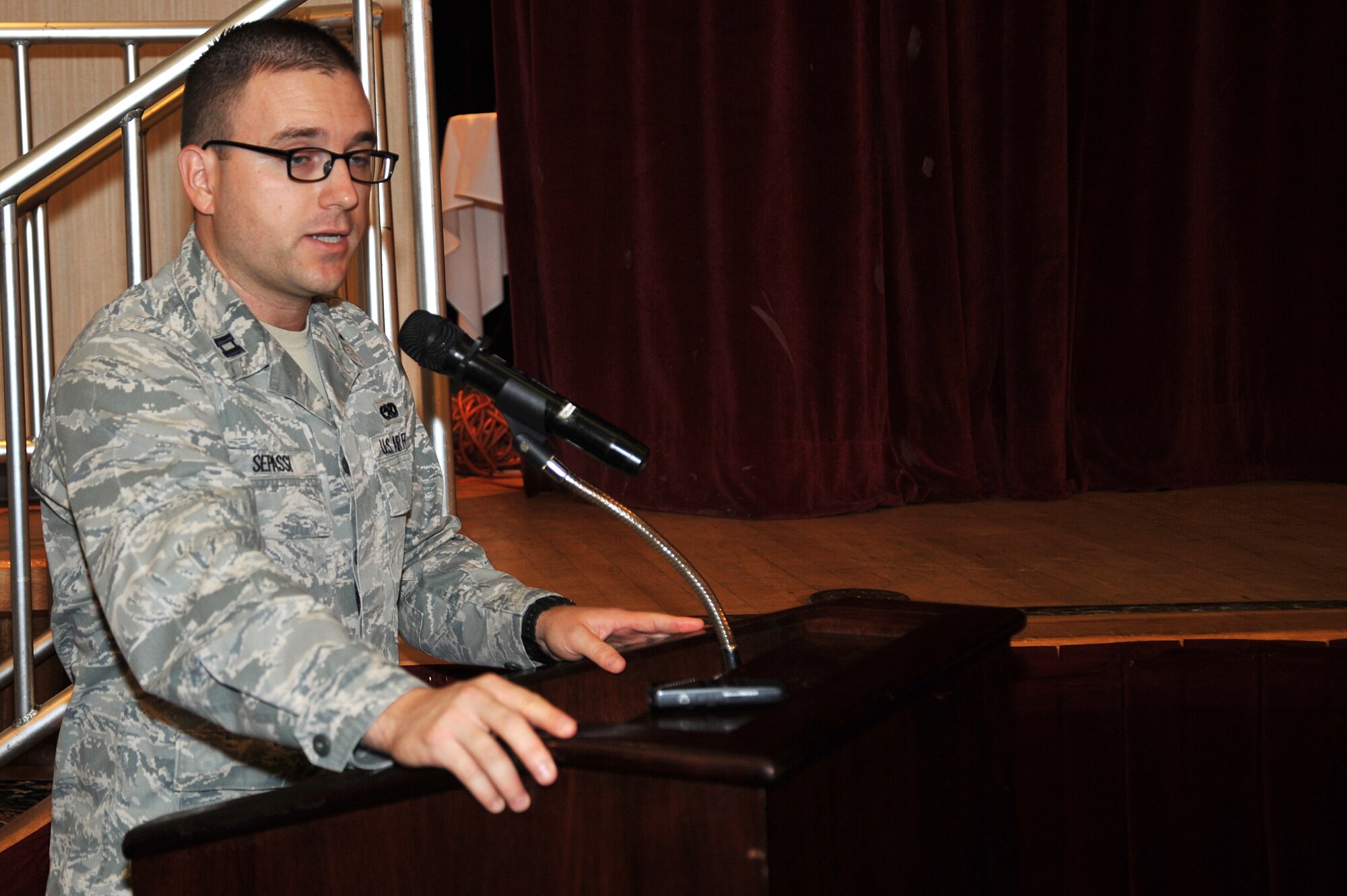 Capt. Larry Sepassi, 36th Aircraft Maintenance Unit assistant officer-in-charge, tells a story about the Combined Federal Campaign and how it can make a difference in people’s lives during the CFC kick-off breakfast at Osan Air Base, Republic of Korea, Sept. 16, 2013. The CFC allows federal employees to donate to more than 25,000 eligible non-profit organizations who provide health and human service benefits throughout the world. (U.S. Air Force photo/Staff Sgt. Emerson Nuñez)