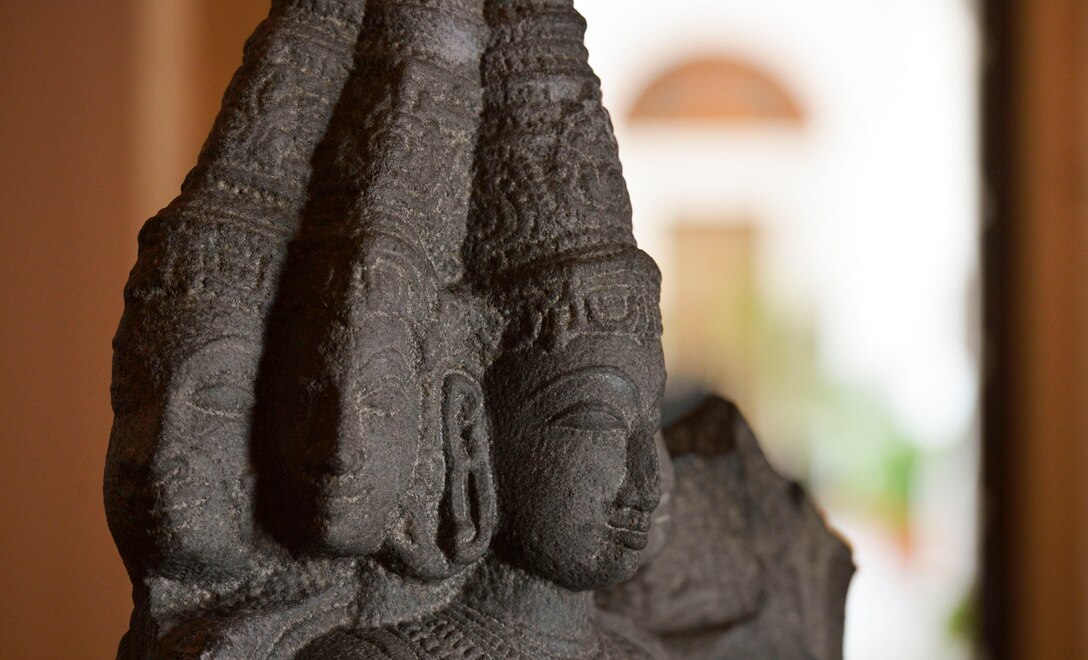 An ancient statue of Karttikeya, the Hindu god of war and victory, stands in the lobby of Hyderabad House, where U.S. Deputy Defense Secretary Ash Carter met with India's National Security Advisor Shivshankar Menon in New Delhi, Sept. 17, 2013. 