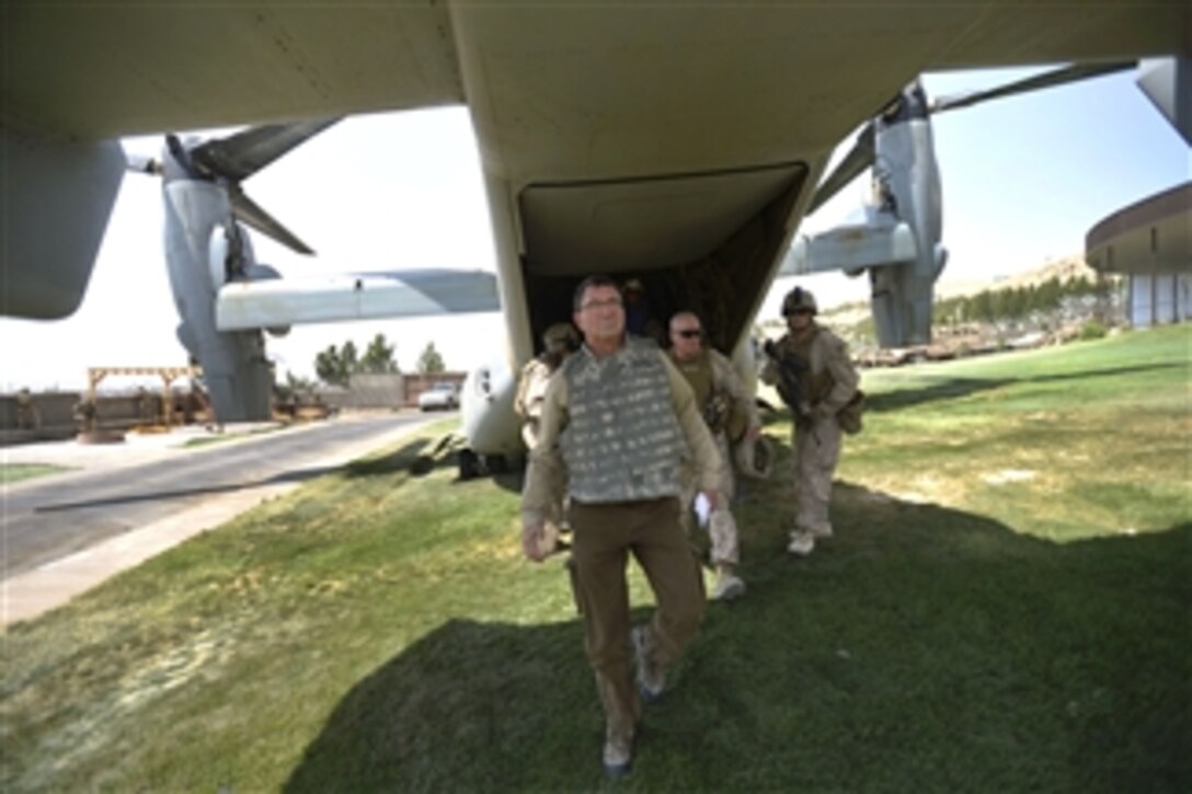 Deputy Secretary of Defense Ashton B. Carter arrives in Herat, Afghanistan, on Sept. 14, 2013, to survey the damage to the U.S. Consulate after it was attacked by the Taliban on Sept. 13th.  Carter will meet with the staff and service members at the consulate to be briefed on the attack.  Carter is on a weeklong trip to Afghanistan, Pakistan and India to meet with senior leaders and troops deployed to the region