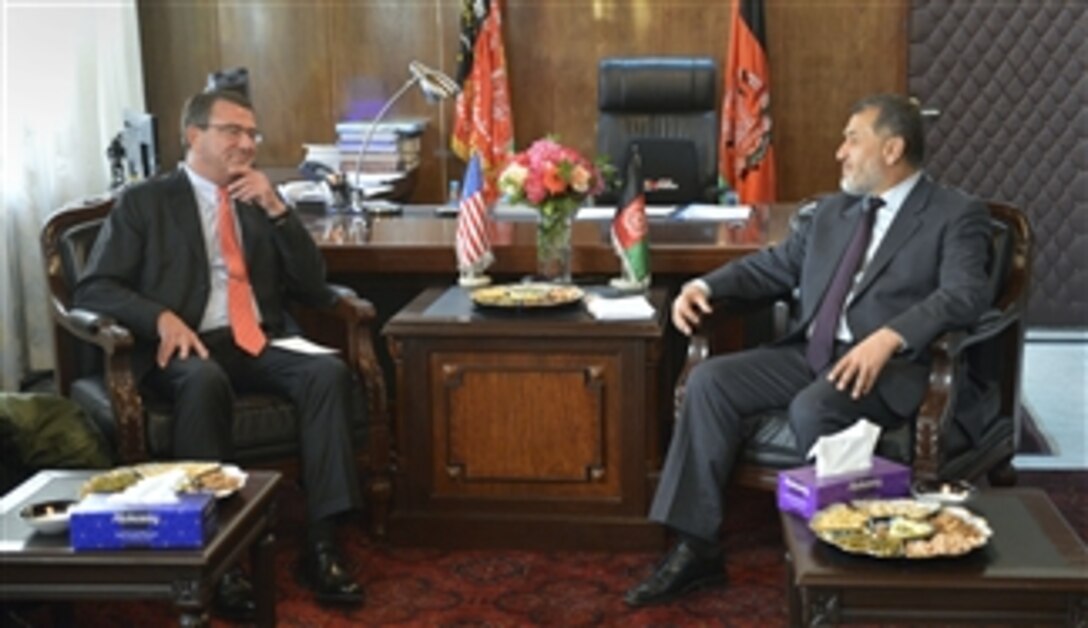 Deputy Secretary of Defense Ashton B. Carter, left, meets with Afghanistan’s Minister of Defense Bismillah Khan Mohammadi at the Afghanistan Ministry of Defense in Kabul, Afghanistan, on Sept. 14, 2013.  Carter is on a weeklong trip to Afghanistan, Pakistan and India to meet with senior leaders and troops deployed to the region.  