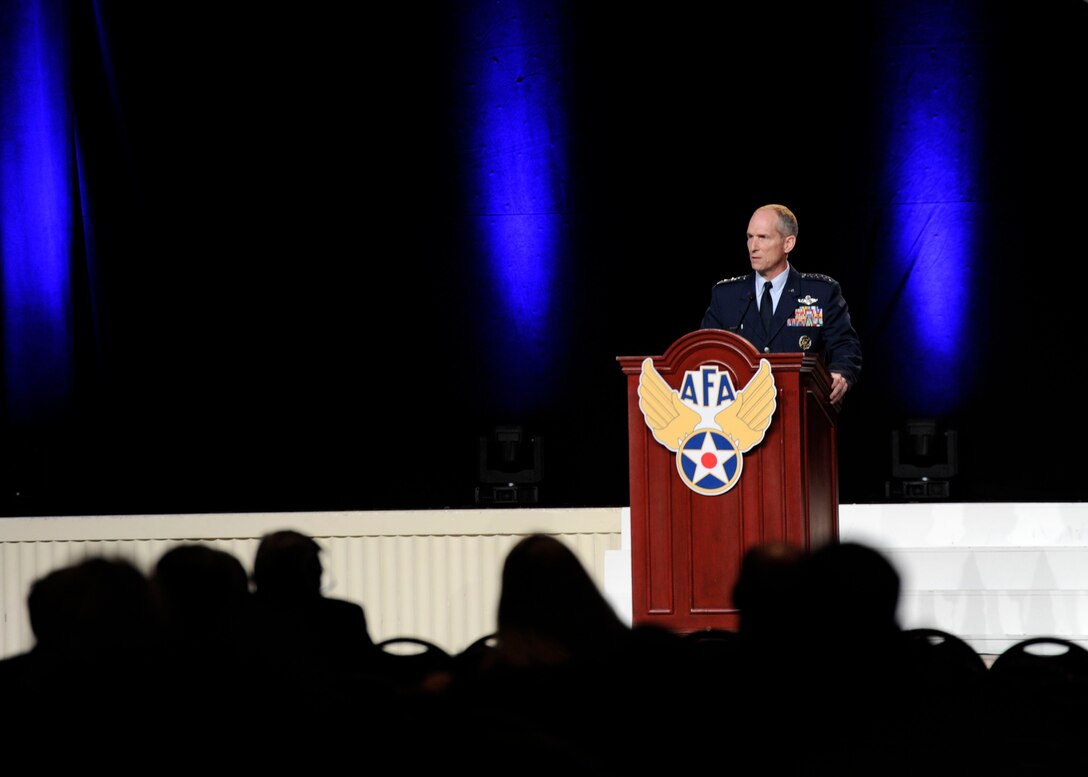 Gen. Mike Hostage addresses audience members during his “Combat Forces in the 2020’s” speech at the Air Force Association’s 2013 Air & Space Conference and Technology Exposition Sept. 17, 2013, in Washington, D.C. A majority of Hostage’s comments were focused around aircraft, though he stated that the most powerful resource is Airmen. Hostage is the Air Combat Command commander. (U.S Air Force photo/Airman 1st Class Nesha Humes)