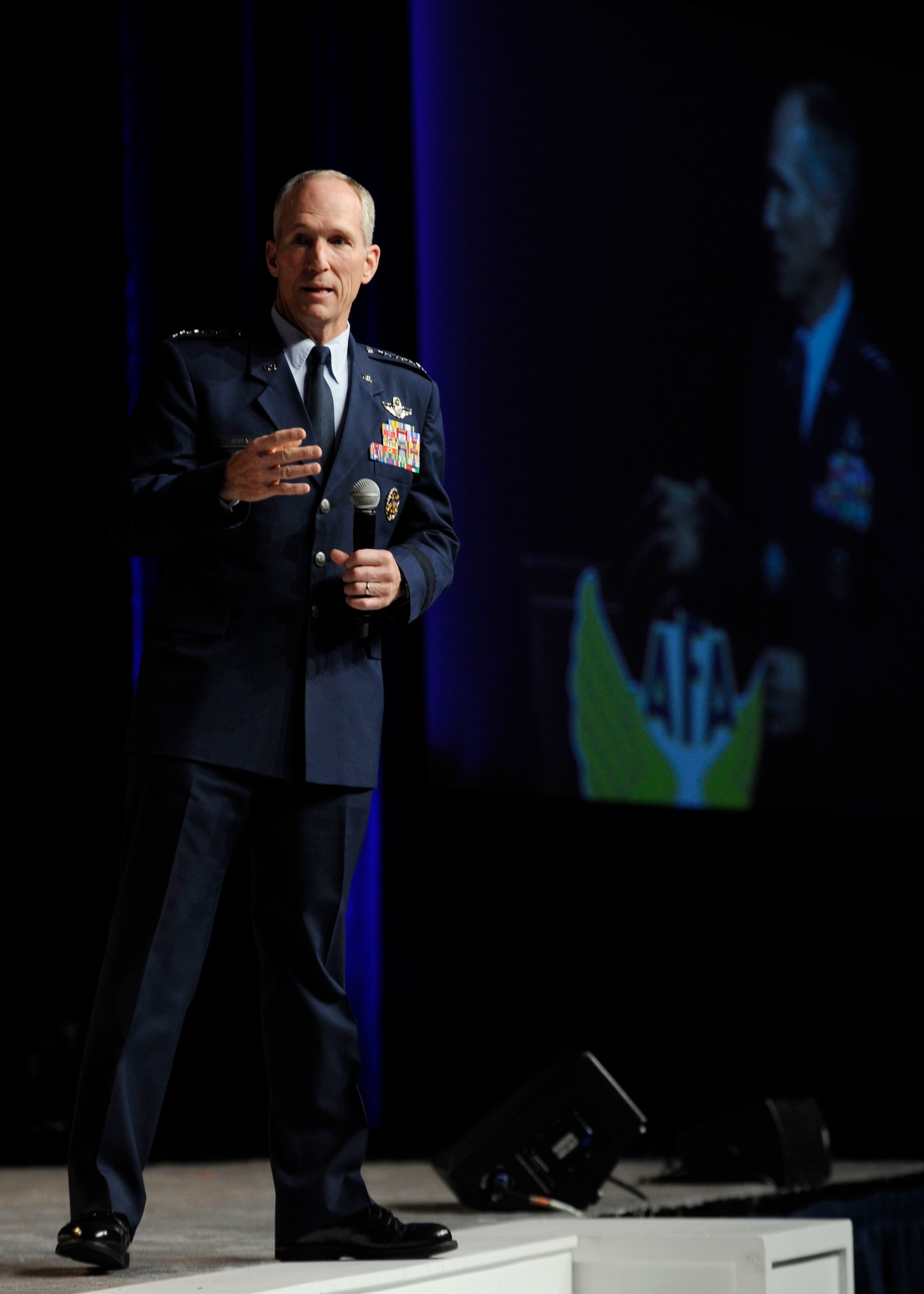 Gen. Mike Hostage addresses audience members during his “Combat Forces in the 2020’s” speech at the Air Force Association’s 2013 Air & Space Conference and Technology Exposition Sept. 17, 2013, in Washington, D.C. A majority of Hostage’s comments were focused around aircraft, though he stated that the most powerful resource is Airmen.  Hostage is the Air Combat Command commander. (U.S Air Force photo/Airman 1st Class Nesha Humes)