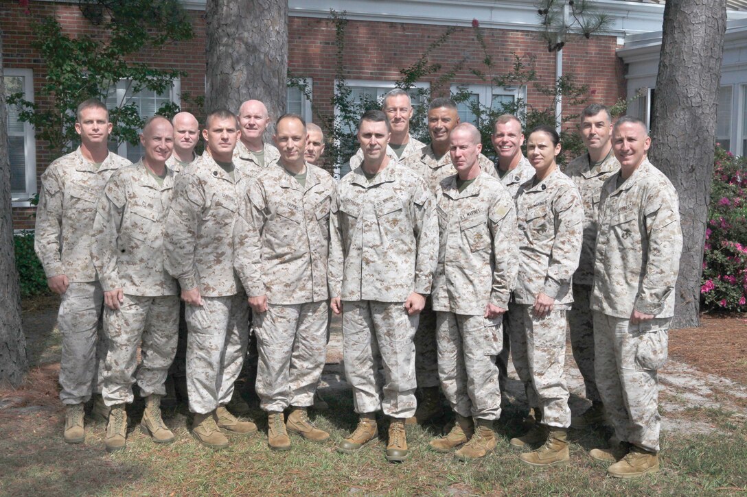 Brig. Gen. Robert F. Castellvi (center) is joined by other MCIEAST installation commanders and sergeants major during a break in a two-day conference held last week at the Paradise Point Officers Club. The leaders were visiting Camp Lejeune to discuss a variety of important issues with the general and his principle staff to include manpower, budget and military construction challenges during a period of growing fiscal restraint.