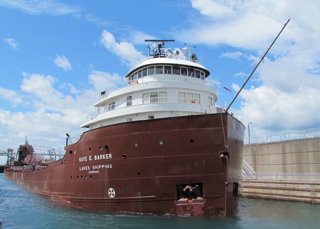 The 767-foot-long Kaye E. Barker heads out of the Poe Lock with a load of taconite bound for Detroit August 5, 2013. It will take her approximately 24 hours to get there from the Soo.