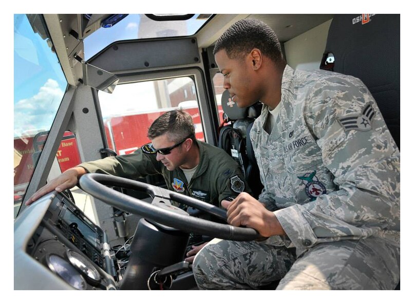 Col. David E. Graff, 325th Fighter Wing commander, gained a first person perspective of the duties performed by Senior Airman Jerod Jones, 325th Civil Engineering fire fighter, as part of the Airman’s Shadow program Sept. 12. (U.S. Air Force photo by Staff Sergeant Javier Cruz)


