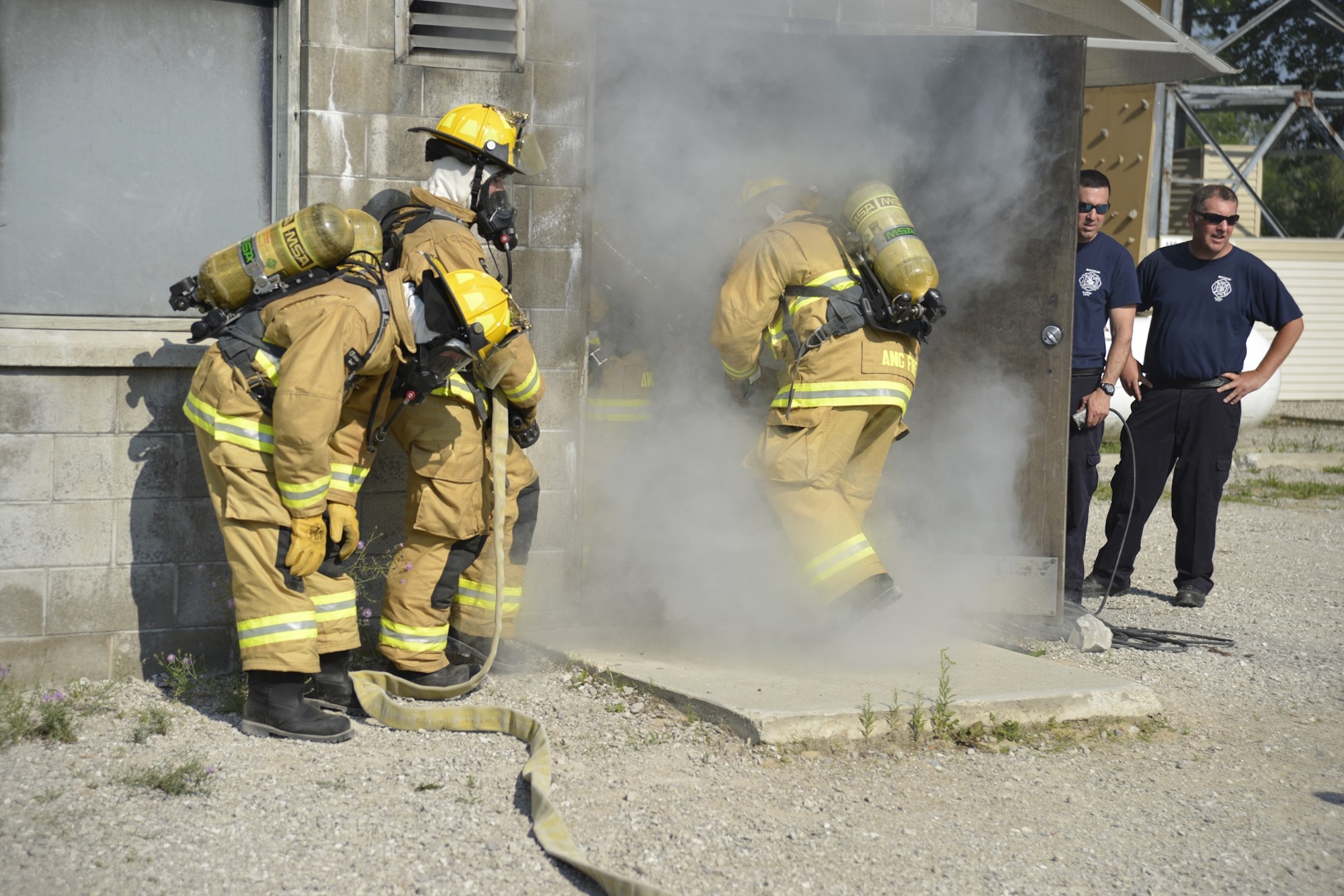 Vermont Air National Guard Fire Department train in Alpena Michigan., July 16, 2013.(U.S. Air National Guard photo by AMN Jeffrey Tatro)