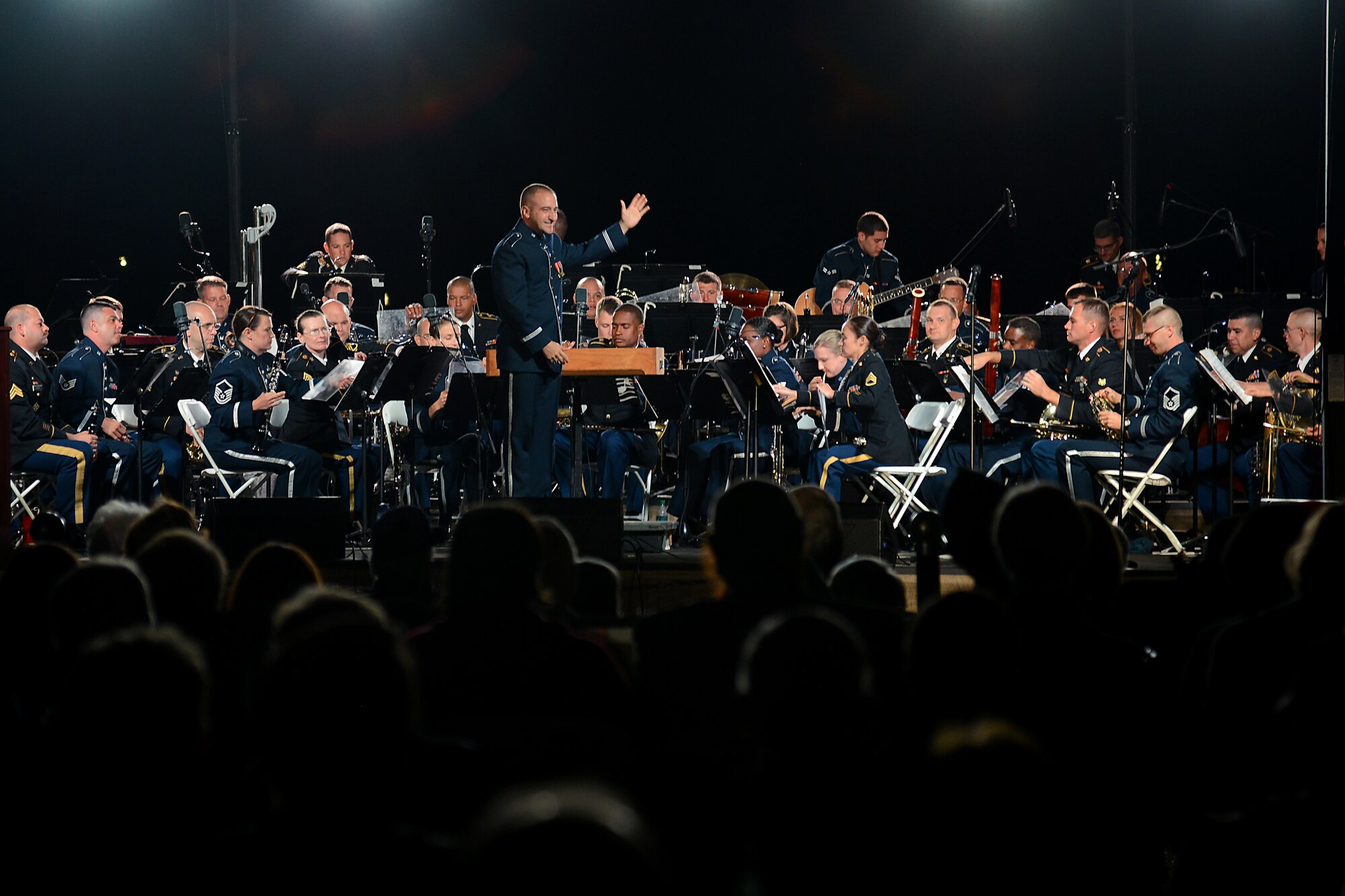 The U.S. Army Training and Doctrine Command Band and U.S. Air Force Heritage of America Band perform during the Constitution Day Concert in Williamsburg, Va., Sept. 17, 2013. The fifth-annual event marked the fifth year of the U.S. Air Force Heritage of America Band performing and the third year of joining forces with the TRADOC Band. (U.S. Air Force photo by Airman 1st Class Victoria H. Taylor/ Released)