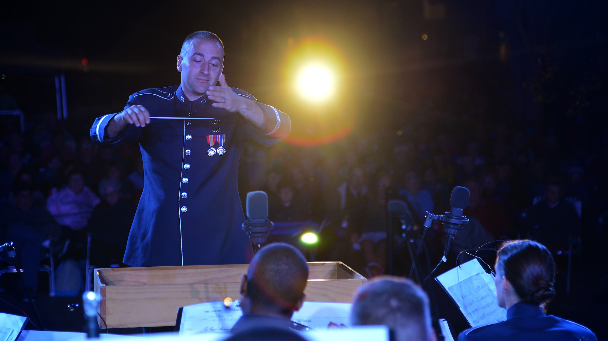 U.S. Air Force 2nd Lt. Justin Lewis, U.S. Air Force Heritage of America Band flight commander, conducts during the Constitution Day Concert in Williamsburg, Va., Sept. 17, 2013. The event paid tribute to the earliest defenders of America’s freedom. (U.S. Air Force photo by Airman 1st Class Victoria H. Taylor/ Released)