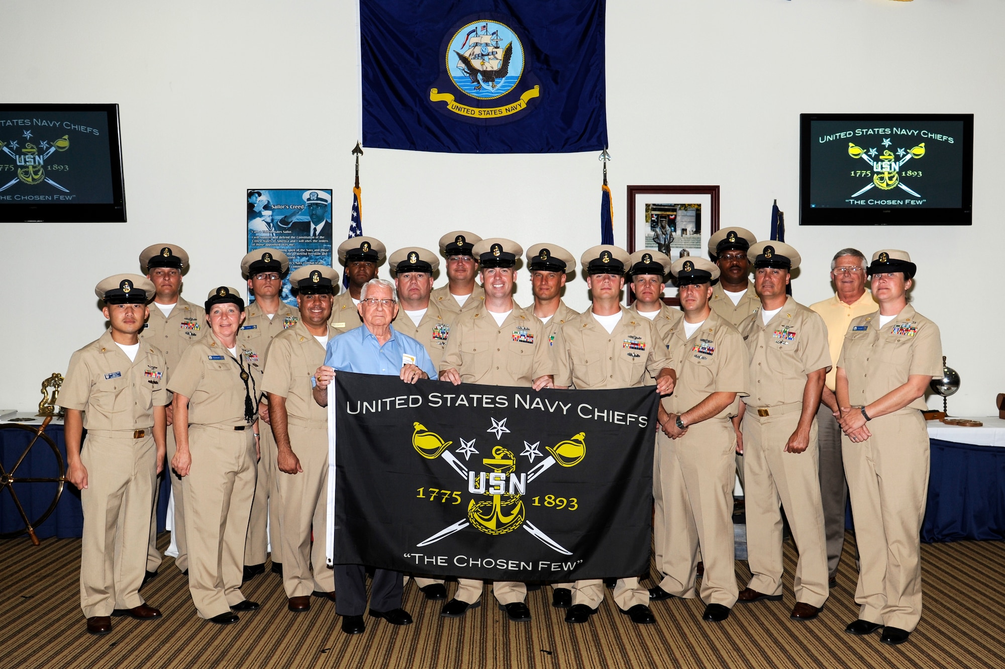 GOODFELLOW AIR FORCE BASE, Texas – Navy Center for Information Dominance Detachment members stand for a group photo during the Navy chief induction ceremony for five of their sailors at the Event Center Sept. 13. Chief Petty Officer Andres Bonilla, Chief Petty Officer Thomas O’Brien, Chief Petty Officer Taylor White, Chief Petty Officer Jeffery McConn, and Chief Petty Officer Jason Ayres pinned on one of the hardest naval ranks to achieve.  (U.S. Air Force photo/Staff Sgt. Austin Knox)