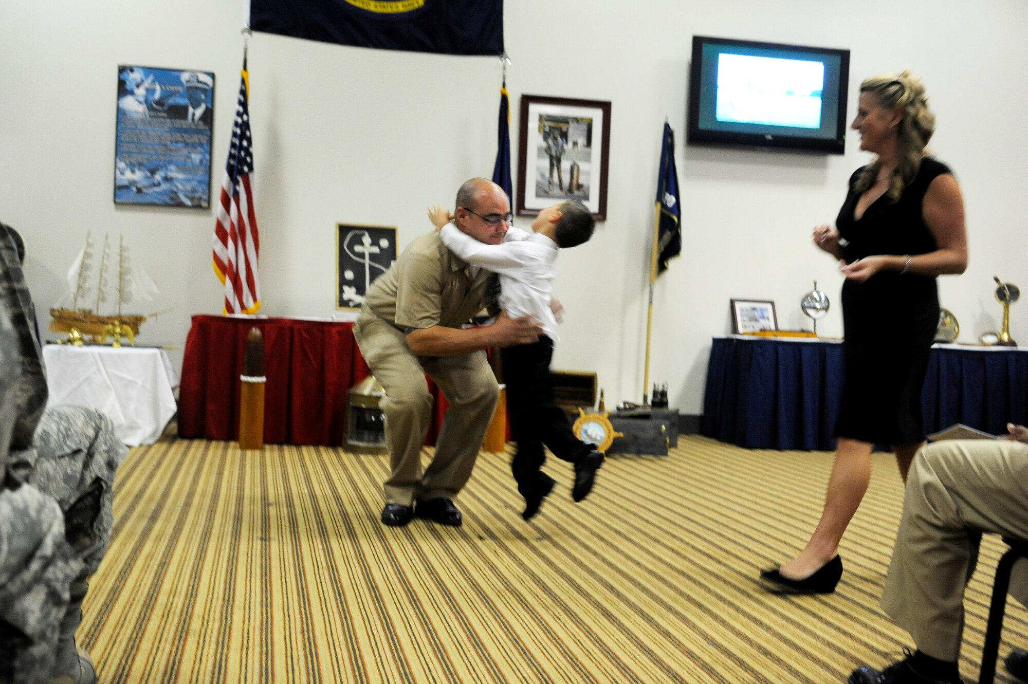 GOODFELLOW AIR FORCE BASE, Texas – Navy Chief Petty Officer Taylor White sets congratulated during a Navy chief inductors ceremony at the Event Center, Sept 13.  Making the grade of E-7 is a life changing rank in the Navy. (U.S. Air Force photo/Staff Sgt. Austin Knox)