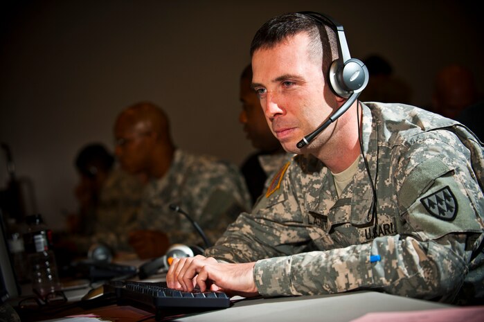 U.S. Army Spc. Cody Lassiter, 32nd Army Air and Mobile Defense Command early warning systems operator, Fort Bliss, Texas, operates a missile defense simulator during Coalition Virtual Flag Sept. 13, 2013, at Nellis Air Force Base, Nev. Coalition Virtual Flag, hosted by the 705th Combat Training Squadron, Distributed Missions Operations Center, Kirtland AFB, N.M., is the largest virtual exercise conducted in the United States. The DMOC enables usage of virtual simulators to connect CVF participants in a simulated synthetic combat environment. (U.S. Air Force photo/Senior Airman Brett Clashman)