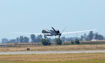 A RQ-4 Global Hawk takes off from Beale Air Force Base, Calif., Sept. 17, 2013.  The Northrop Grumman Corp. announced the aircraft achieved 100,000 flight hours Sept. 5. (U.S. Air Force photo by Airman 1st Class Bobby Cummings/Released)