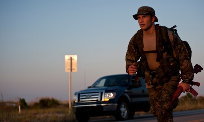 A Tactical Air Control Party candidate nears the end of a 12-mile ruck march in Fort Walton Beach, Fla., Sept. 13, 2013. (U.S. Air Force photo/Senior Airman Krystal M. Garrett) 
