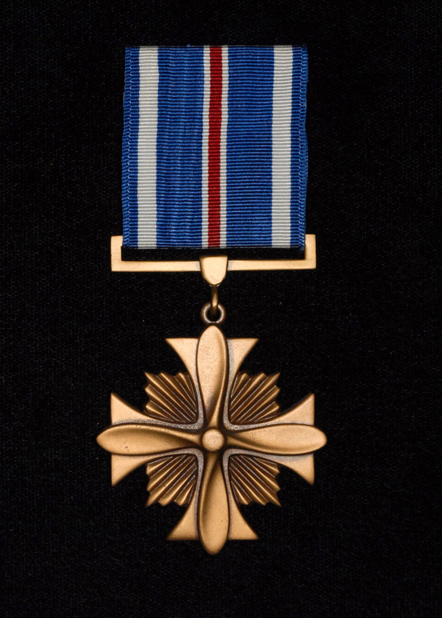 The Distinguished Flying Cross, authorized by an Act of Congress of July 2, 1926, is awarded to any officer or enlisted person of the Armed Forces of the United States who shall have distinguished her/himself in actual combat in support of operations by heroism or extraordinary achievement while participating in an aerial flight, subsequent to November 11, 1918.The SECAF authorized the wear of the Valor "V" Device on DFCs awarded for Heroism.