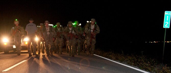 Tactical Air Control Party candidates begin a 12-mile ruck march in Fort Walton Beach, Fla., Sept. 13, 2013. The TACP candidates had four hours to complete the ruck march, which is one of the final tests they must pass before graduating technical school. (U.S. Air Force photo/Senior Airman Krystal M. Garrett) 

