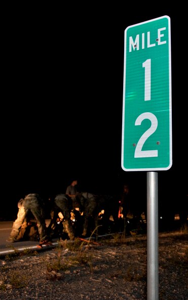 Special Tactics candidates prepare for a 12-mile ruck march in Fort Walton Beach, Fla., Sept. 13, 2013. The Special Tactics candidates had four hours to complete the ruck march, which is one of the final tests they must pass before graduating technical school. (U.S. Air Force photo/Senior Airman Krystal M. Garrett)