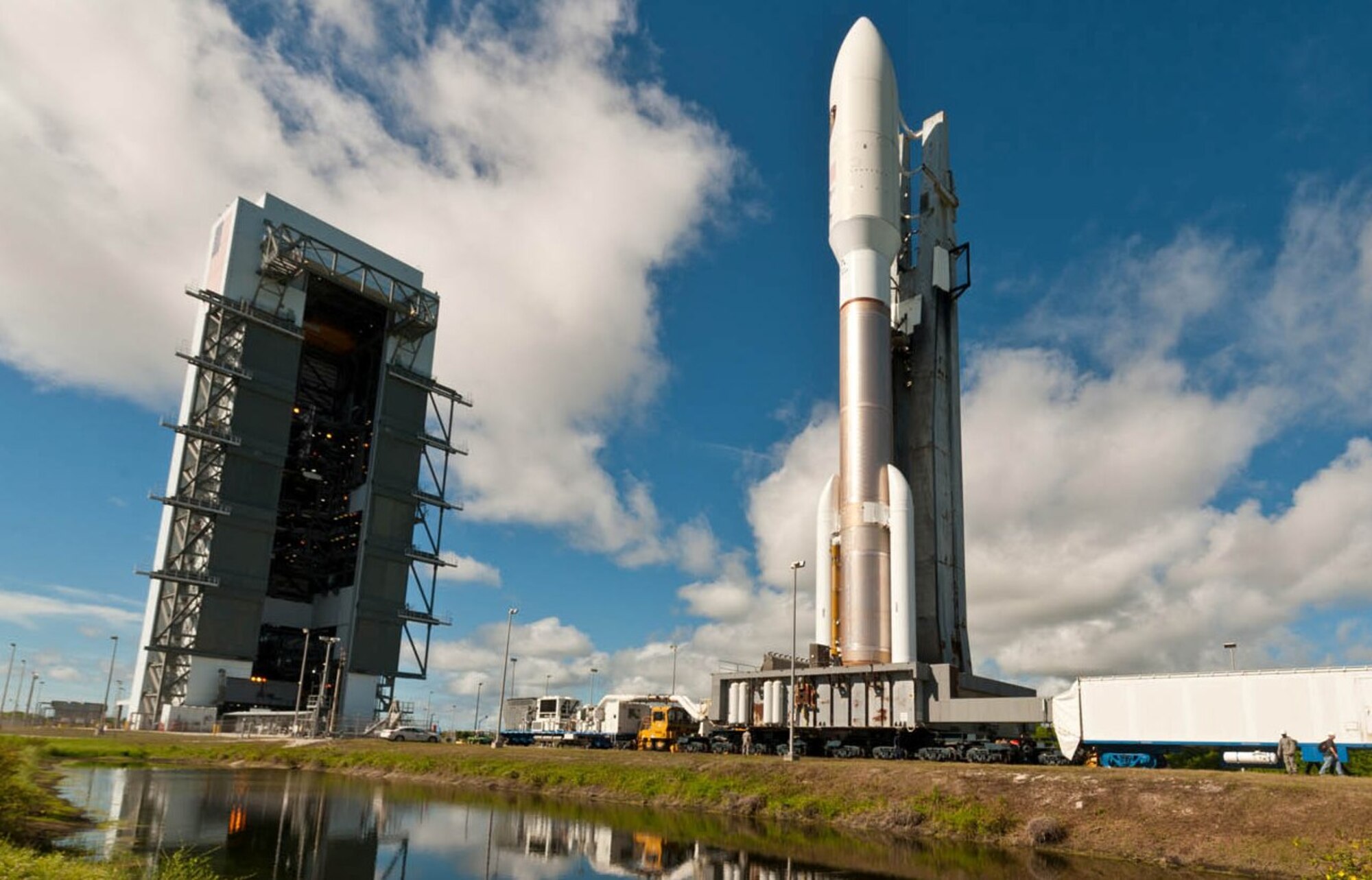 A United Launch Alliance Atlas V rolls out to Space Launch Complex-41 at
Cape Canaveral Air Force Station in Florida with the Air Force's third
Advanced Extremely High Frequency (AEHF-3) payload.  
"It is wonderful to witness the teamwork between our wing and all our
partners involved in making this mission a success," said Brig. Gen. Nina
Armagno, who also served as the Launch Decision Authority for the launch
from the Morrell Operations Center here at the Cape. (ULA Photo/Pat Corkery)
