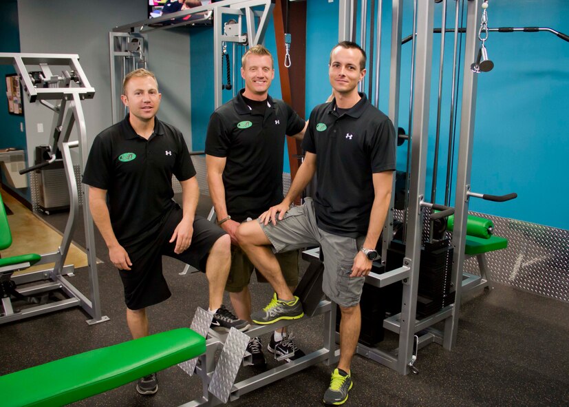 Tech. Sgt. Nathan Yeaman (left) and Master Sgt. Ronald Beard, both with the 419th Security Forces Squadron, and Master Sgt. Cory Bobo (right), 419th Civil Engineer Squadron, partnered to open Prolific Fitness & Spa in their civilian lives. Since opening the gym, they've had to balance full-time civilian jobs and families along with their Reserve careers. (Courtesy photo)