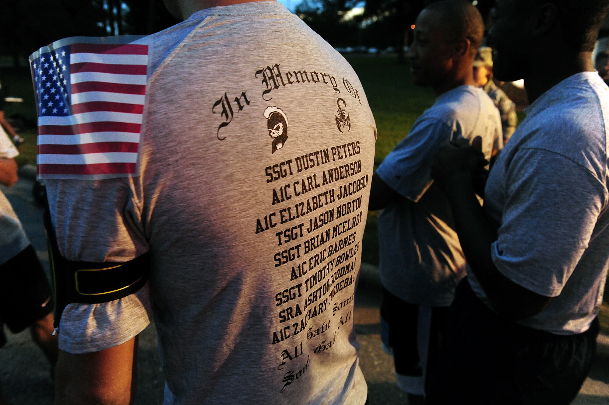 A group of runners wait to begin the Run for the Fallen 5K/Half-Marathon at Seymour Johnson Air Force Base, N.C., Sept. 14, 2013.  Many race participants wore shirts to honor fallen warriors and comrades.  The event was hosted by the 4th Fighter Wing Company Grade Officers’ Council; a private organization made up of Air Force lieutenants and captains.  (U.S. Air Force photo by Airman 1st Class Brittain Crolley)