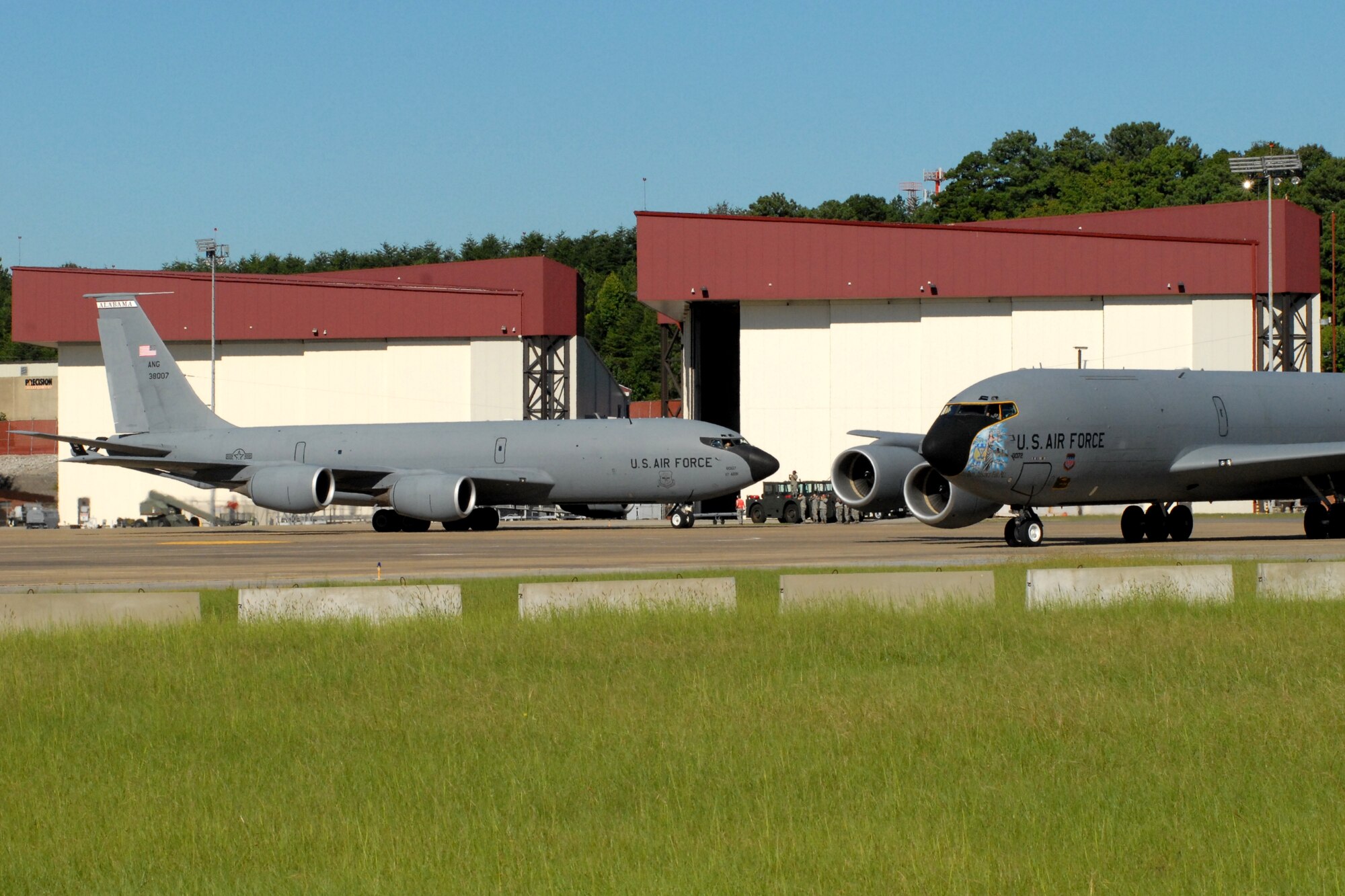 BIRMINGHAM, Ala. -- Two KC-135R aircraft taxi during five-ship training mission here on Saturday. Four of the KC-135s refueled A-10 aircraft. The fifth KC-135R returned to base after the formation training was complete. A KC-135R from the 171st Air Refueling Wing in Pittsburgh, Pa. was flown in the formation and was used during the refueling mission. (U.S. Air National Guard photo by Maj. Pam Carroll/Released)