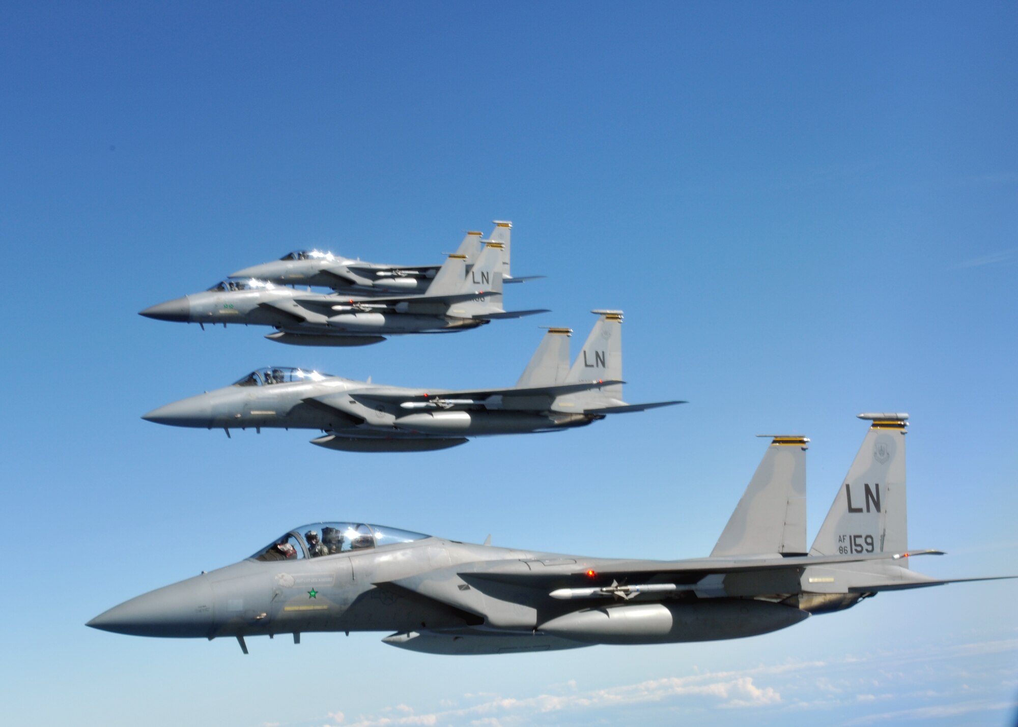 Four U.S. Air Force F-15C Eagles fly in formation after refueling Sept. 12, 2013, on their way to the Arctic Challenge exercise in Norway. The F-15C, in coordination with fighters from other nations, provided the air-to-air attack element in many of the scenarios during the exercise. (U.S. Air Force photo by 1st Lt. Christopher Mesnard/Released)