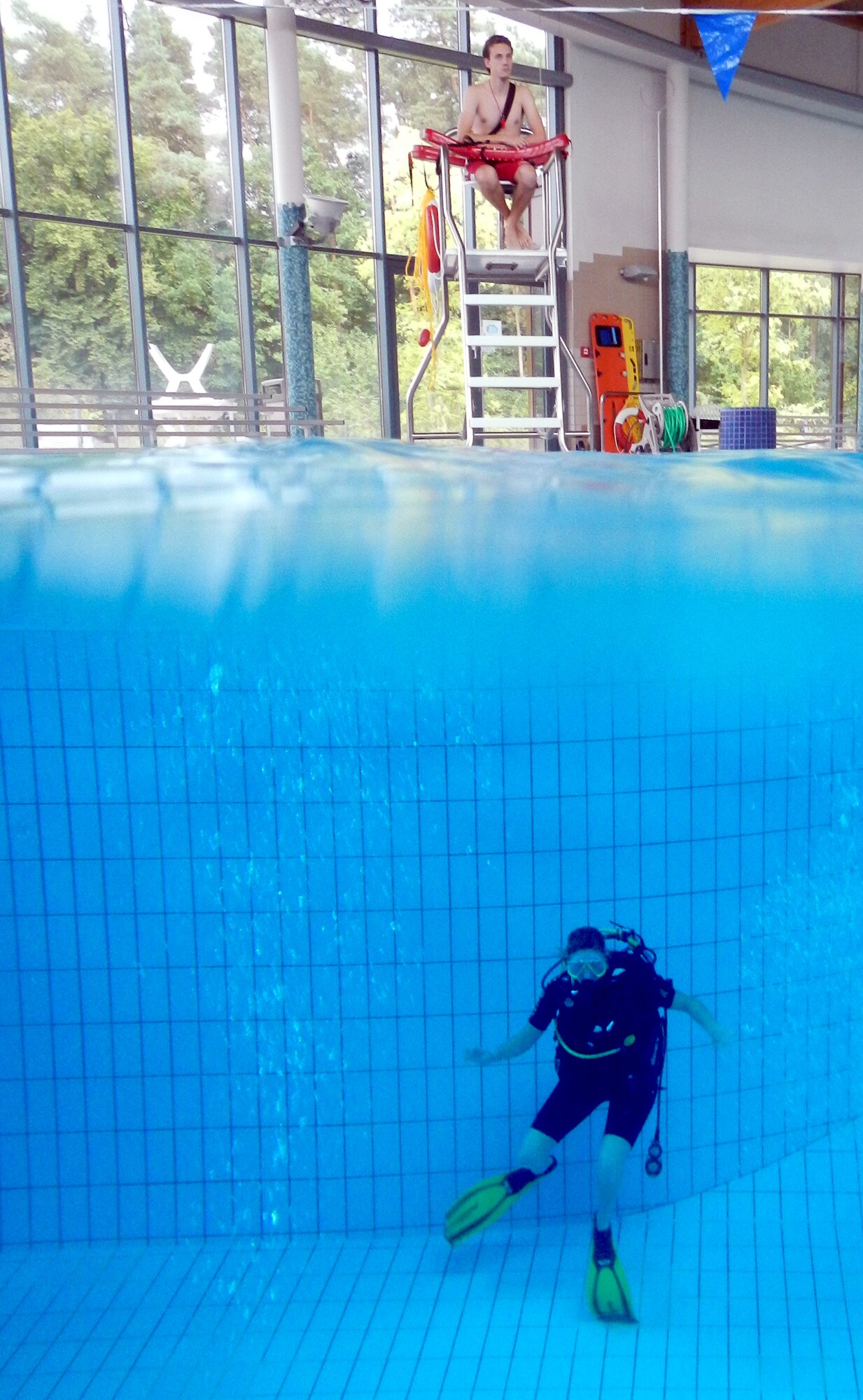 A scuba diving student spends several hours diving in the pool in order to earn certification, Sept. 11, 2013, Ramstein Air Base, Germany.  (U.S. Air Force photo/Senior Airman Caitlin Guinazu)