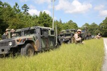 Marines with Combat Logistics Regiment 25, 2nd Marine Logistics Group provide security for a massive casualty response drill during a regimental field exercise aboard Camp Lejeune, N.C., Sept. 12, 2013. The exercise provided training in a number of scenarios devised to prepare service members for deployment. (U.S. Marine Corps photo by Lance Cpl. Shawn Valosin)