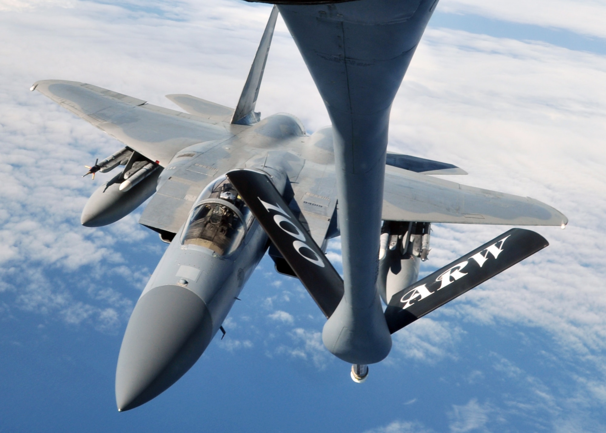 A U.S. Air Force F-15C Eagle finishes refueling with a U.S. Air Force KC-135R Stratotanker Sept. 12, 2013, en route to the Arctic Challenge exercise. The F-15C, in coordination with fighters from Norway, Sweden, Finland and the U.K., provided the air-to-air attack element in many of the scenarios during the exercise. 