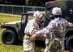 Soldiers from the Maryland Army National Guard's 231st Chemical Company, based in Greenbelt, Md., decontaminate fellow Soldiers and their equipment during a Sept. 8, 2013, training exercise at Gunpowder Military Reservation.