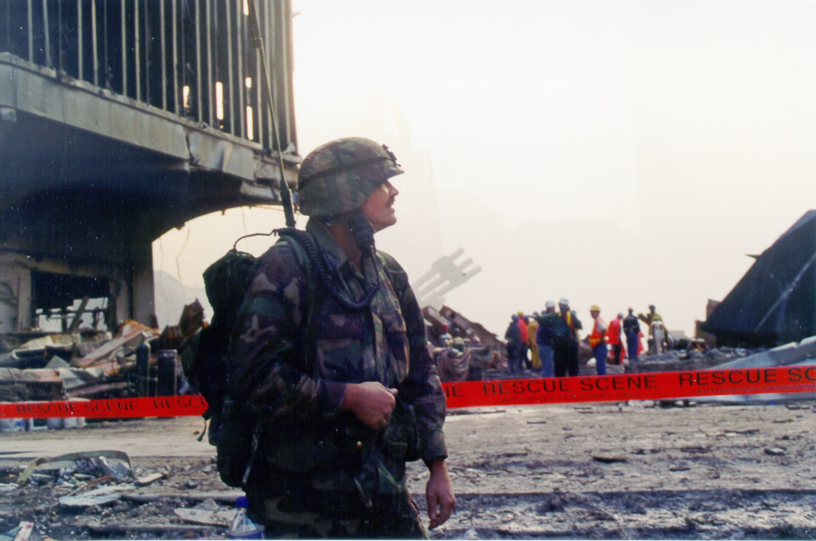 New York Army National Guard Spc. Christian Miller from Company C, 1st Battalion, 105th Infantry surveys ground zero devastation Sept. 13, 2001, two days after the 9/11 terror attacks.