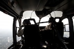 Counterdrug's aviation unit flies the UH-72A Lakota on a search for marijuana plants. On board is also a law enforcement agent with Rensselaer County. If found, the marijuana is either marked for eradication at a later time or ground support is called in to destroy it.
