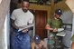 Staff Sgt. Ryan Willis, structures NCO from the 18th Civil Engineer Squadron, Kadena Air Base, Japan, and Warrant Officer 1st Class Phal Ry from Royal Cambodian Armed Forces prepare to apply mortar to a health center window frame Sept. 11, 2013, during Operation Pacific Angel 13-5 at Takeo Province, Cambodia. The health center is one of three that is undergoing renovations. Thirty-six U.S. forces and RCAF have teamed up to complete renovations scheduled to end Sept. 14, 2013. 