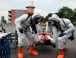 Four Pennsylvania National Guard Soldiers carry an actor playing an injured victim of a natural disaster July 25, 2012 at Lancaster County Public Safety Training Center. The Army and Air Guard members participated in a weeklong training event to prepare to aid other first responders in a large-scale emergency.