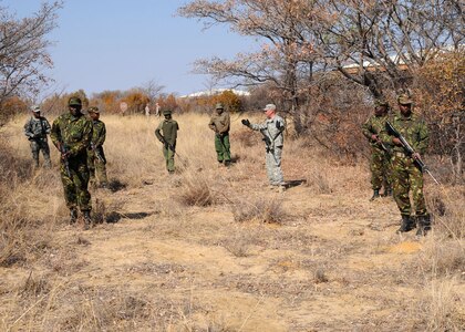 New Jersey Army National Guard Staff Sgt. Dustin Widas, a squad leader with Company A 1-114th, leads a patrol during training at Thebephatshwa Air Base in Botswana. Widas is in Botswana as part of Southern Accord 12, an annual combined, joint exercise that brings together U.S. military personnel with counterparts from the Botswana Defense Force to conduct humanitarian assistance/disaster relief operations, peace keeping operations and aeromedical evacuation to enhance military capabilities and interoperability.