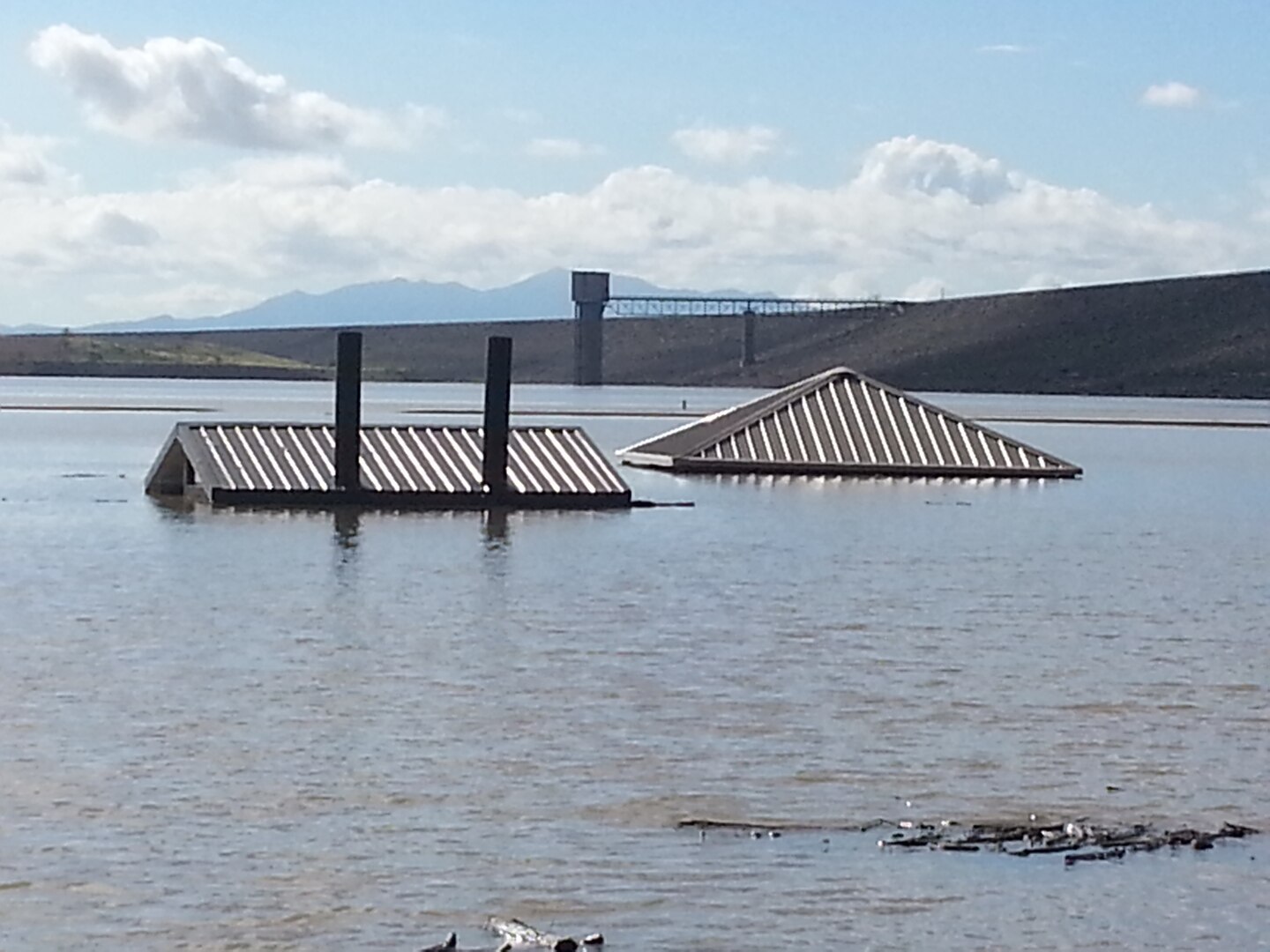 COCHITI LAKE, N.M., -- Shelters at the swim beach, Sept. 16, 2013. The lake rose approximately 15 feet during the heavy rains in mid-September 2013, damaging the shelters and the swim beach area.