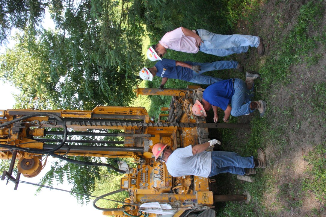 Chris Woodward - Chris  Bontje -Jason Paschel
and Brian Jordan test the soil for possible use on levee work in Louisiana.
