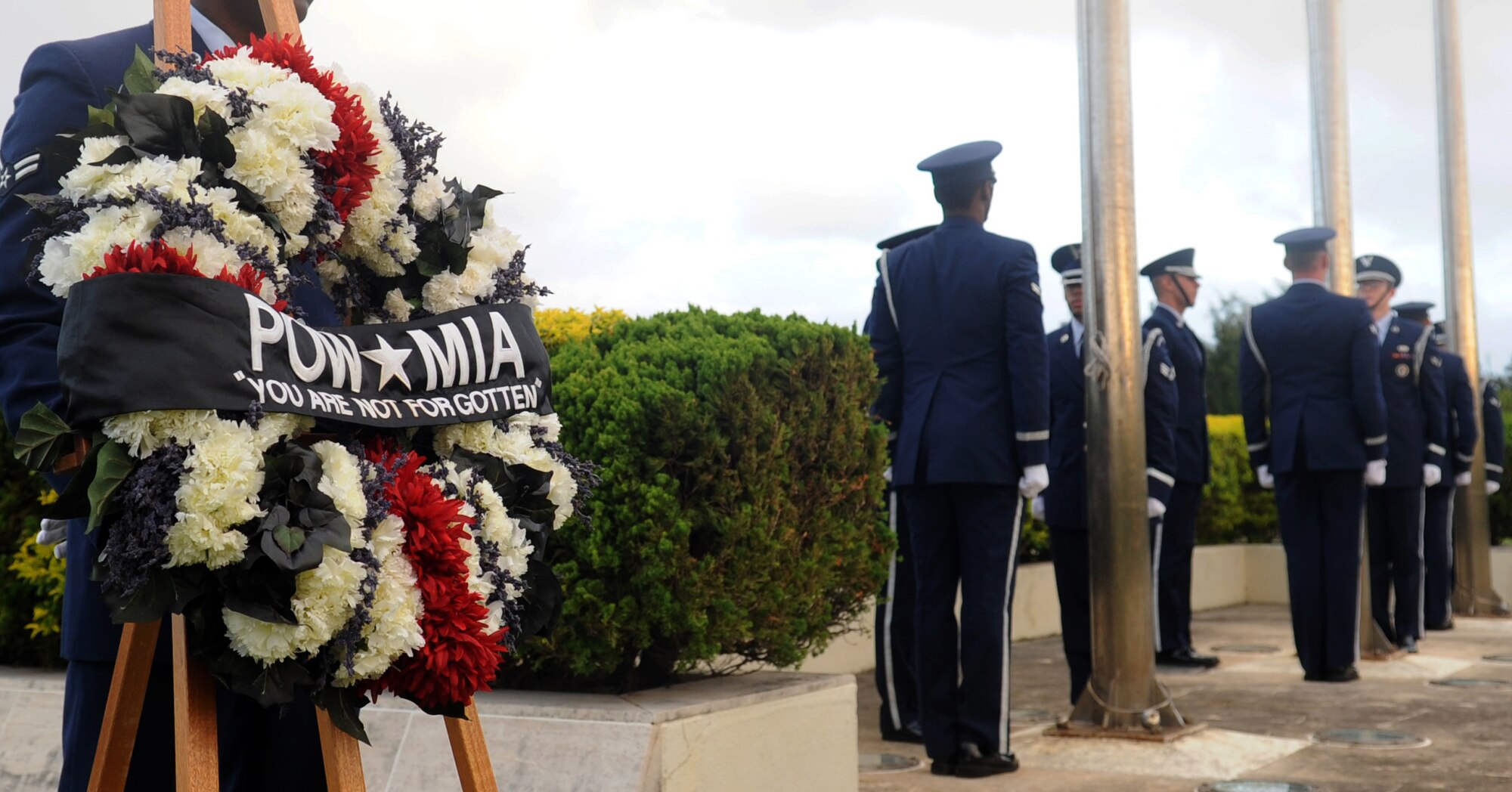 A POW/MIA flag ceremony was held on Kadena Air Base, Japan, Sept. 20, 2013. National POW/MIA Remembrance Day is a day of remembrance and hope for the speedy and safe return of American prisoners of war and those still missing in action. It also hopes for the return of the remains of fallen soldiers. (U.S. Air Force photo by Naoto Anazawa)
