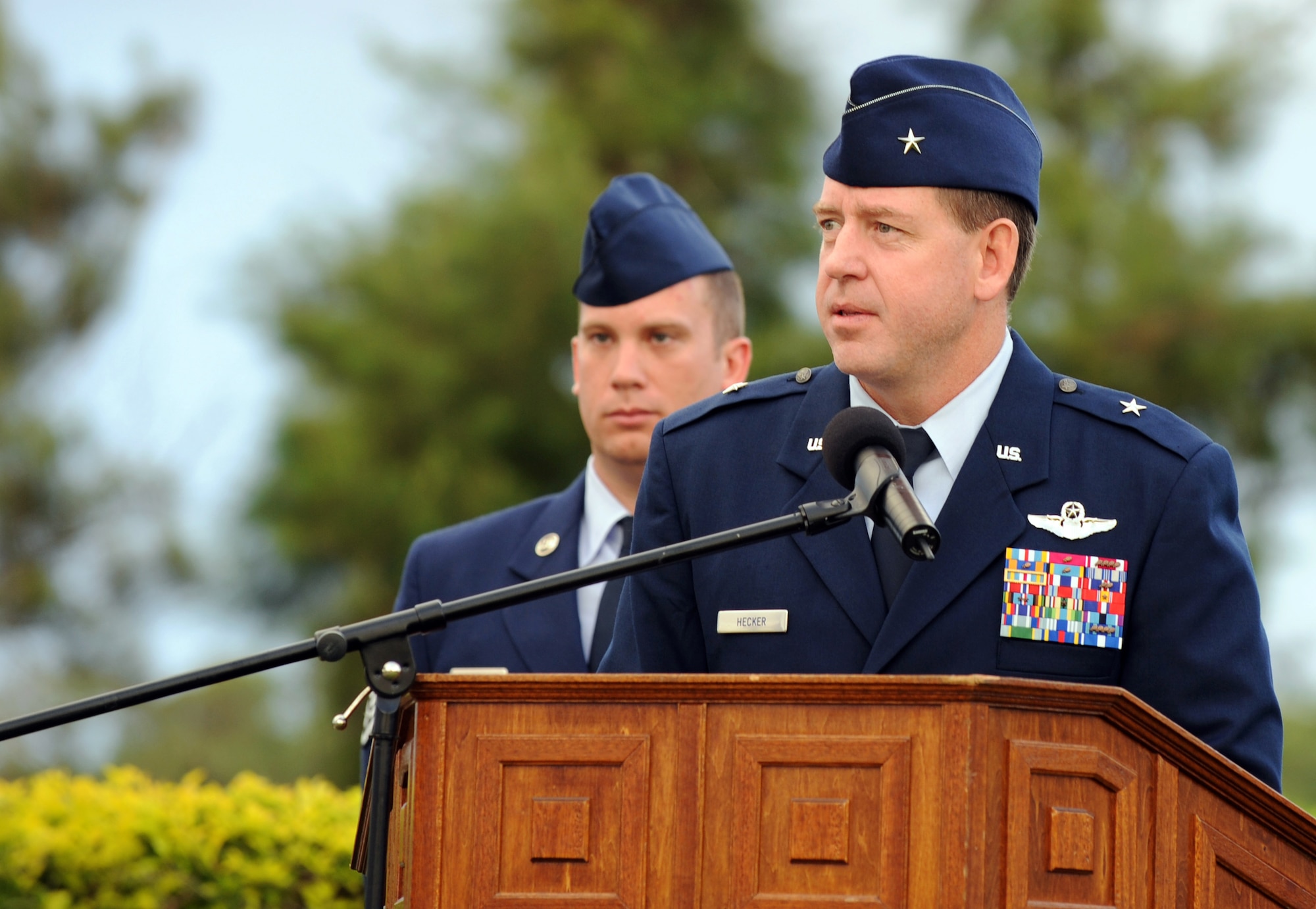 U.S. Air Force Brig. Gen. James Hecker, 18th Wing commander, speaks during the POW/MIA flag ceremony on Kadena Air Base, Japan, Sept. 20, 2013. National POW/MIA Remembrance Day is a pause to remember the sacrifices and service of those who were prisoners of war as well as those who are missing in action, and their families. (U.S. Air Force photo by Naoto Anazawa)