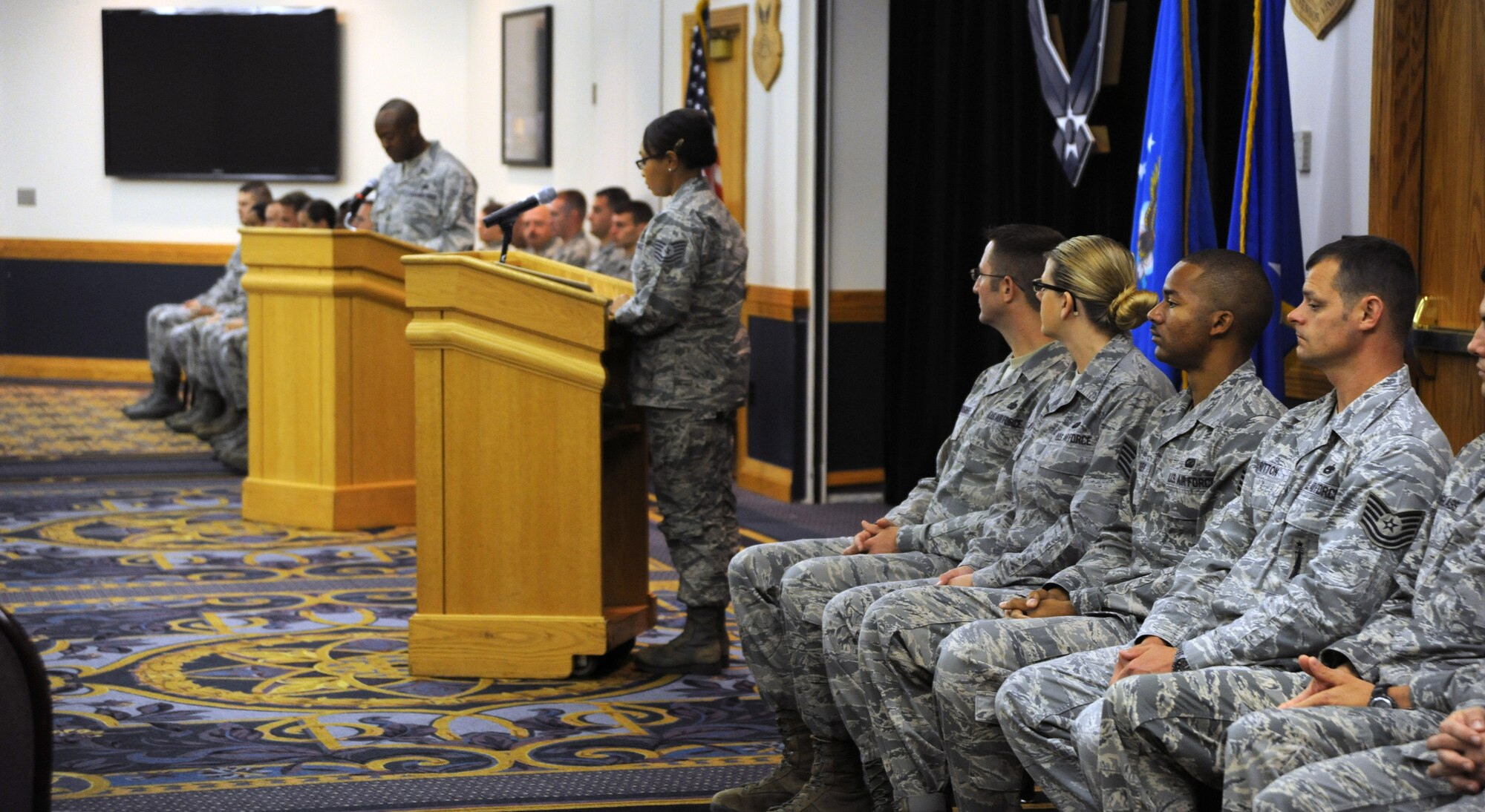 Airmen from around Whiteman wait for their turn to read the U.S. Constitution during the second annual Constitution reading ceremony, Sept. 17, 2013, at Whiteman Air Force Base, Mo. Nearly 30 Airmen were chosen to read lines from the document, which was signed 226 years. (U.S. Air Force photo by Staff Sgt. Brigitte N. Brantley/Released)