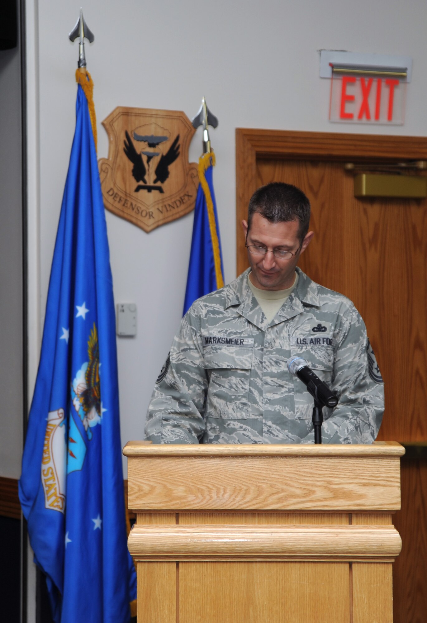 U.S. Air Force Master Sgt. Jeremy Marksmeier, 509th Force Support Squadron first sergeant, reads the U.S. Constitution during the second annual Constitution reading ceremony, Sept. 17, 2013, at Whiteman Air Force Base, Mo. All Service members pledge to support and defend the Constitution when joining the military. (U.S. Air Force photo by Staff Sgt. Brigitte N. Brantley/Released)