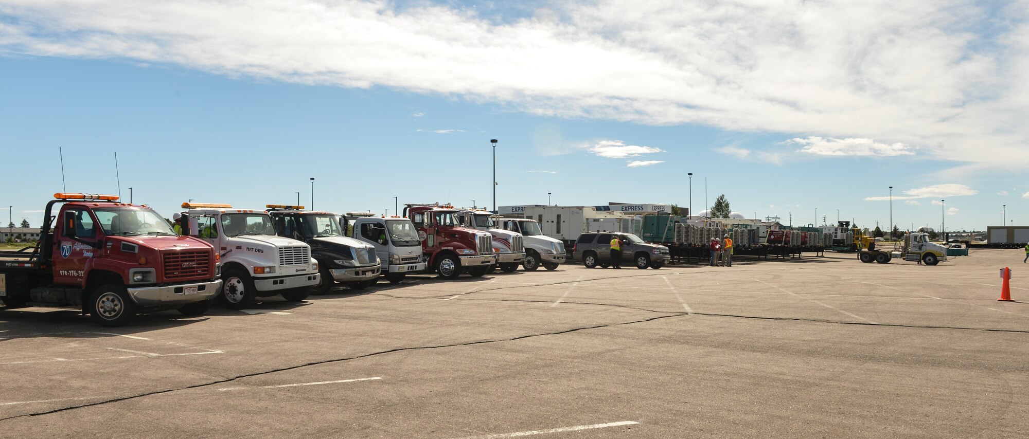 The Army Corps of Engineers and contractors stage flood relief equipment Sept. 17, 2013, at Buckley Air Force Base, Colo., to support Coloradans affected by the flooding. Flood relief aid was needed after Colorado suffered up to 15 inches of rain that caused massive flooding across the Front Range. (U.S. Air Force photo by Staff Sgt. Paul Labbe/Released)