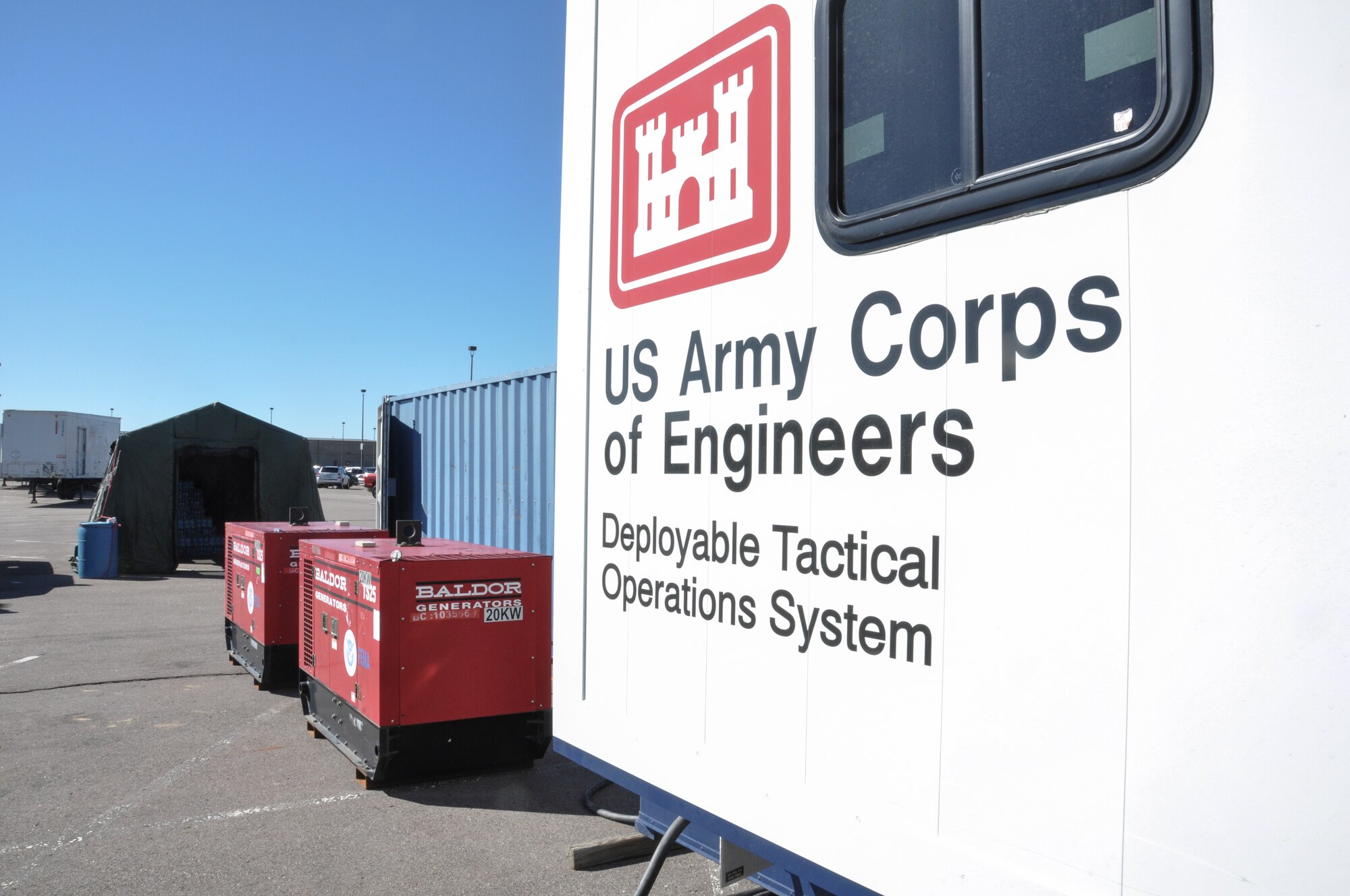 The Army Corps of Engineers and contractors stage flood relief equipment Sept. 17, 2013, at Buckley Air Force Base, Colo., to support Coloradans affected by the flooding. Flood relief aid was needed after Colorado suffered up to 15 inches of rain that caused massive flooding across the Front Range. (U.S. Air Force photo by Staff Sgt. Nicholas Rau/Released)